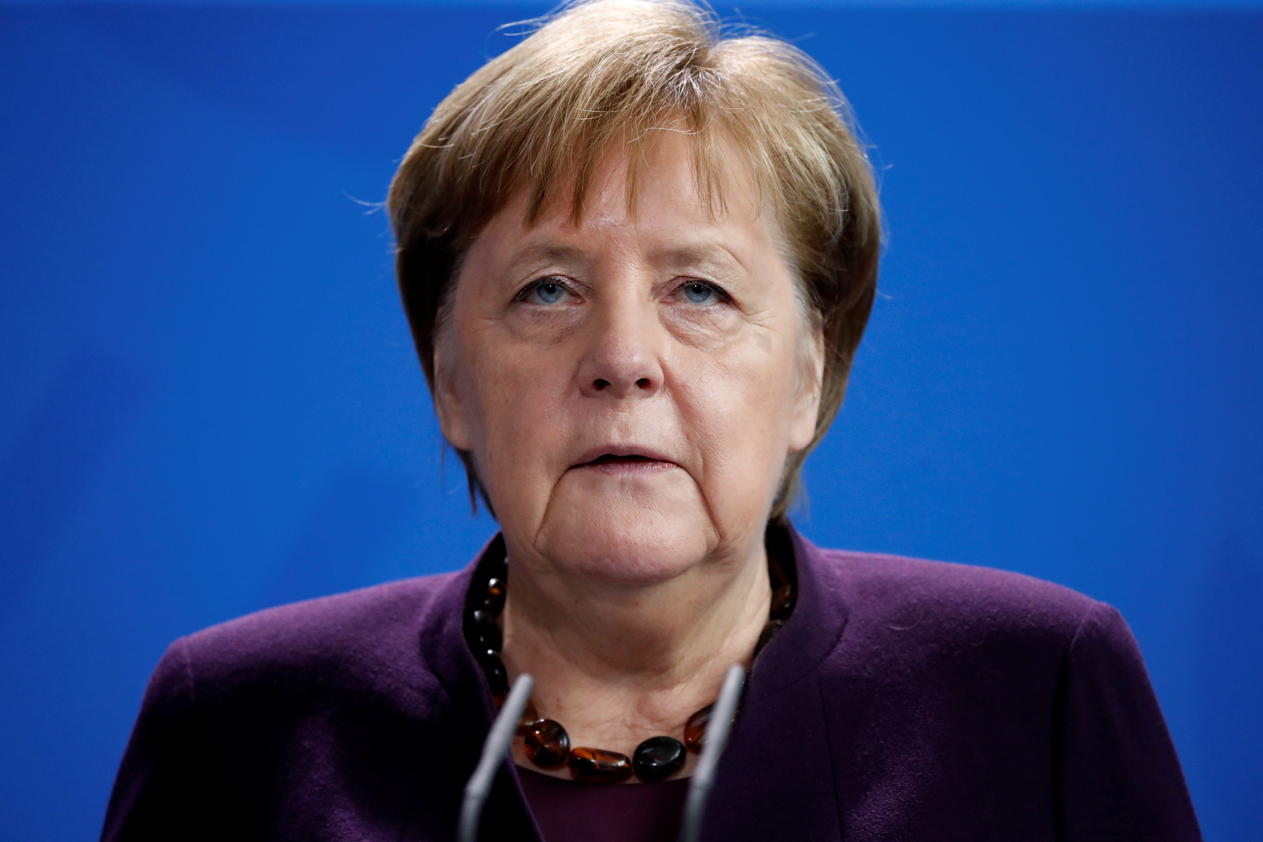 2020-02-20T113305Z_326356425_RC2B4F9F946J_RTRMADP_3_GERMANY-SHOOTING-MERKEL