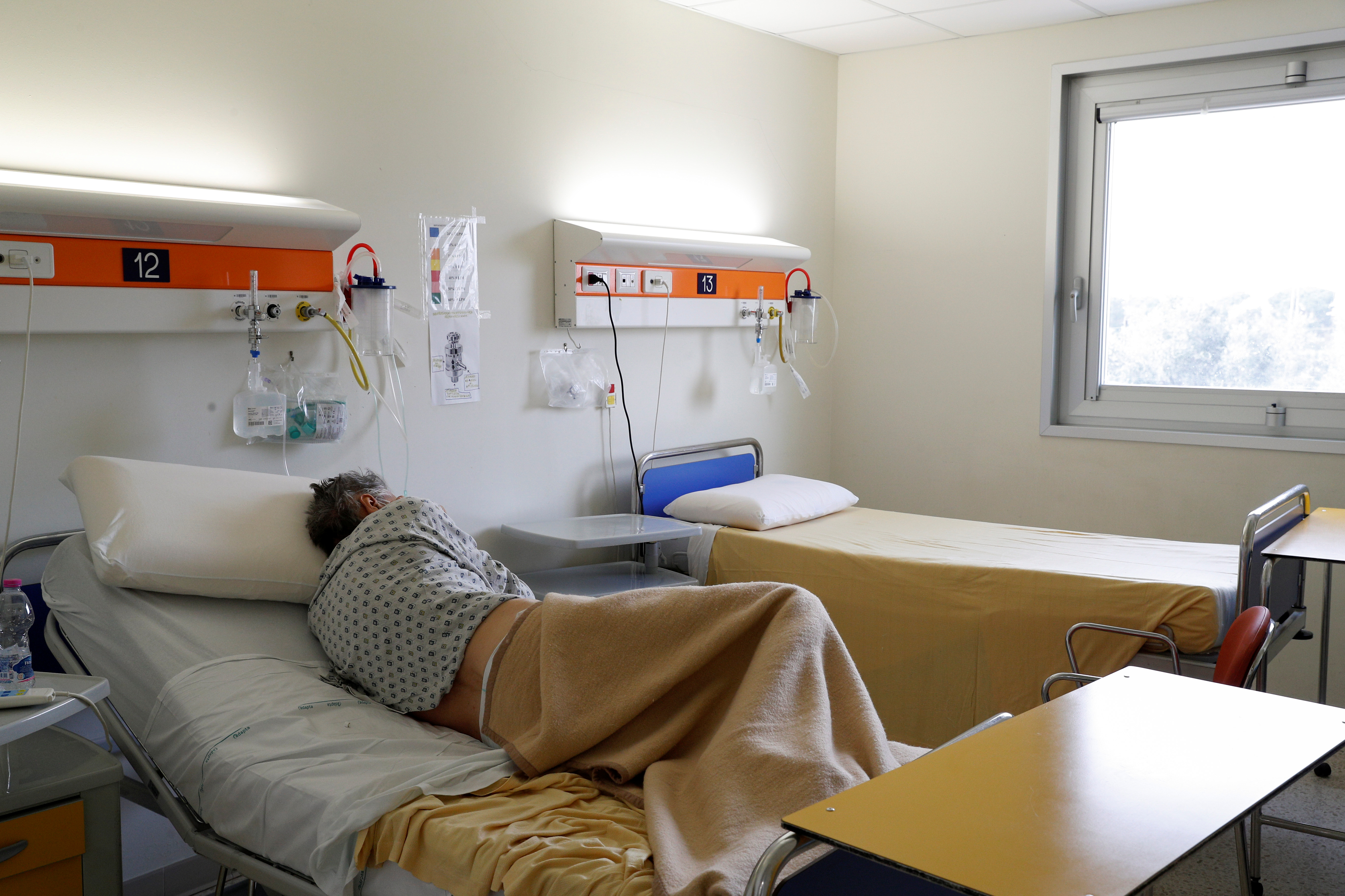 2020-03-30T143316Z_1850785263_RC2EUF9KQWAT_RTRMADP_3_HEALTH-CORONAVIRUS-ITALY