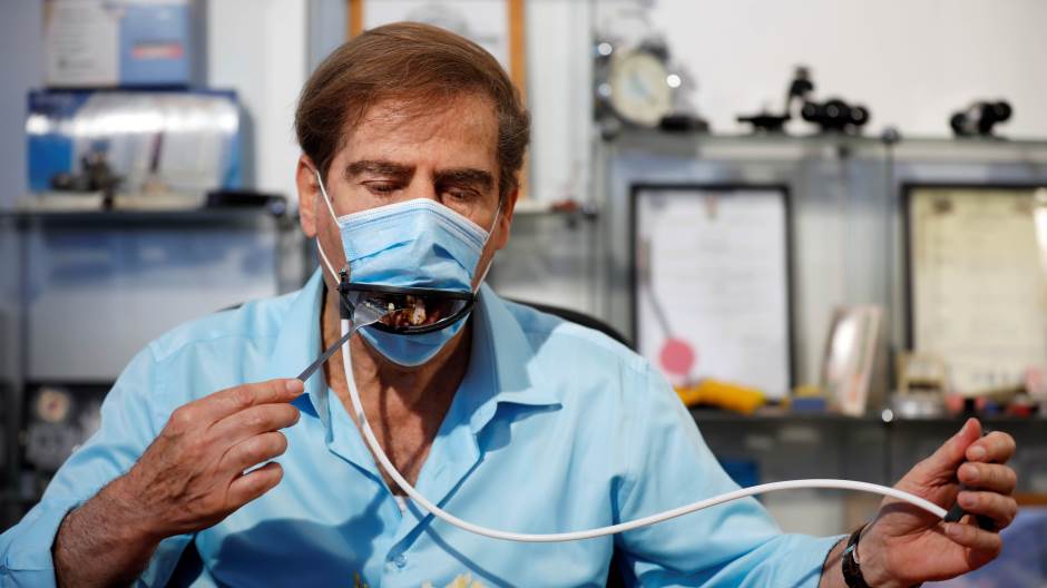 2020-05-18T135202Z_2029519916_RC21RG9C14RM_RTRMADP_3_HEALTH-CORONAVIRUS-ISRAEL-MASK