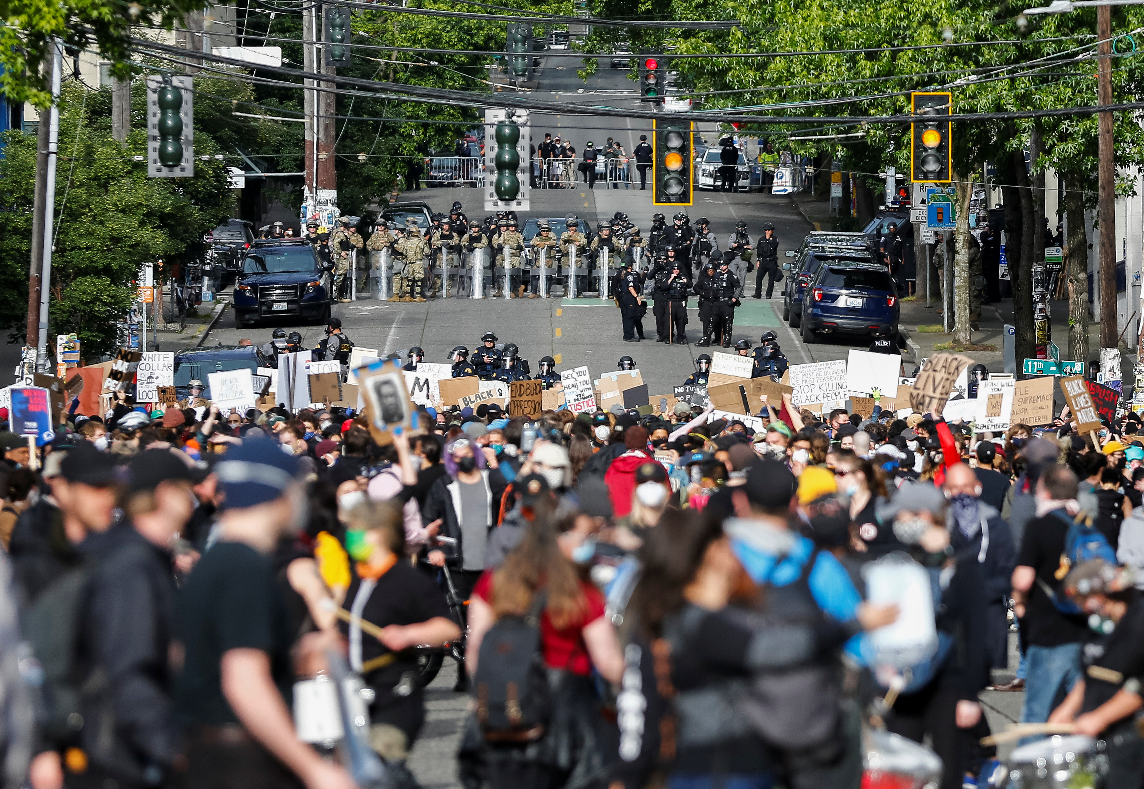2020-06-03T023705Z_446099692_RC2E1H9G73PV_RTRMADP_3_MINNEAPOLIS-POLICE-PROTESTS-SEATTLE