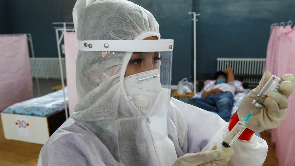 2020-07-17T133718Z_1151155136_RC21VH91YMB0_RTRMADP_3_HEALTH-CORONAVIRUS-KAZAKHSTAN-KYRGYZSTAN