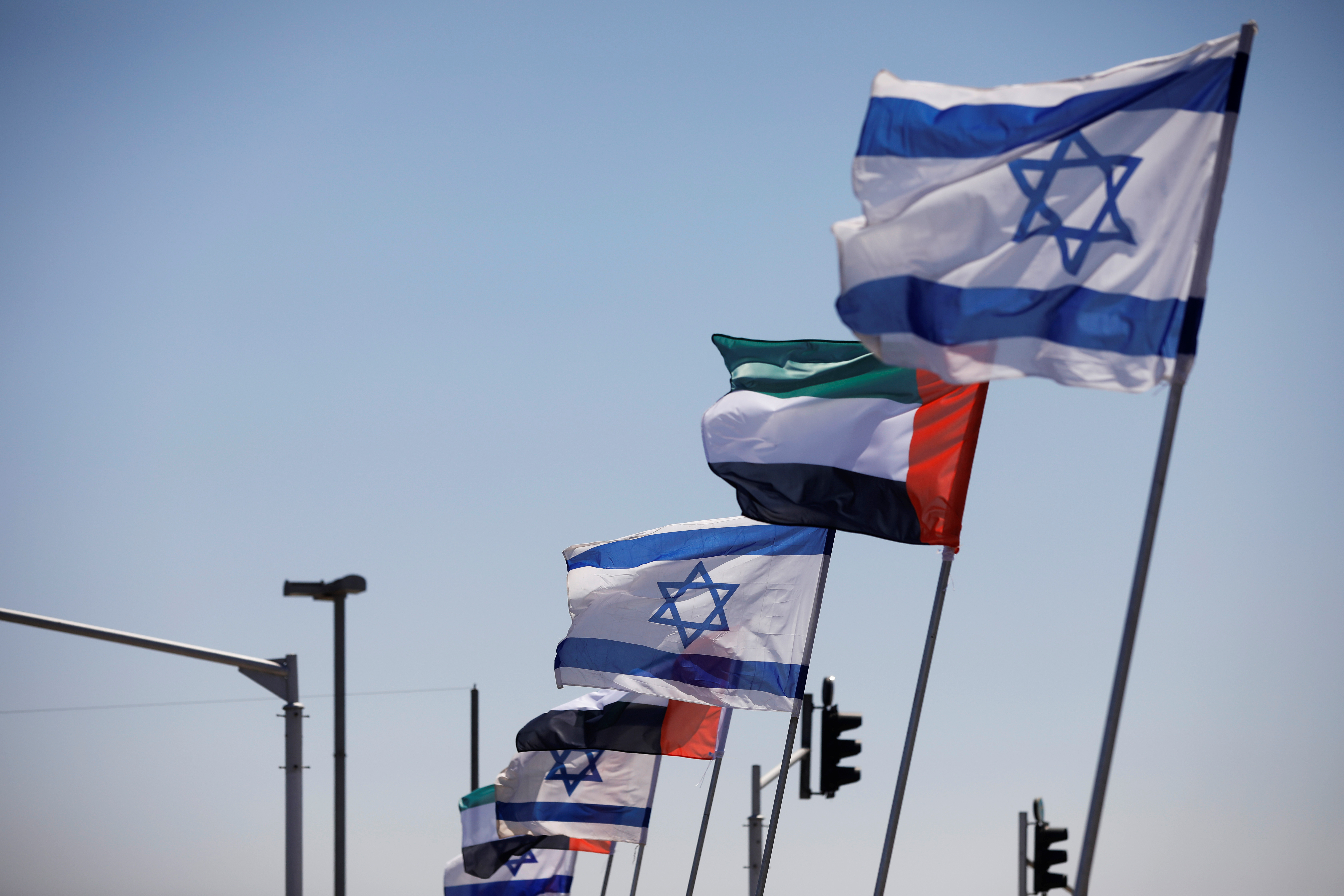 2020-08-17T093534Z_1757498498_RC2LFI9Y8LTS_RTRMADP_3_ISRAEL-EMIRATES-FLAGS