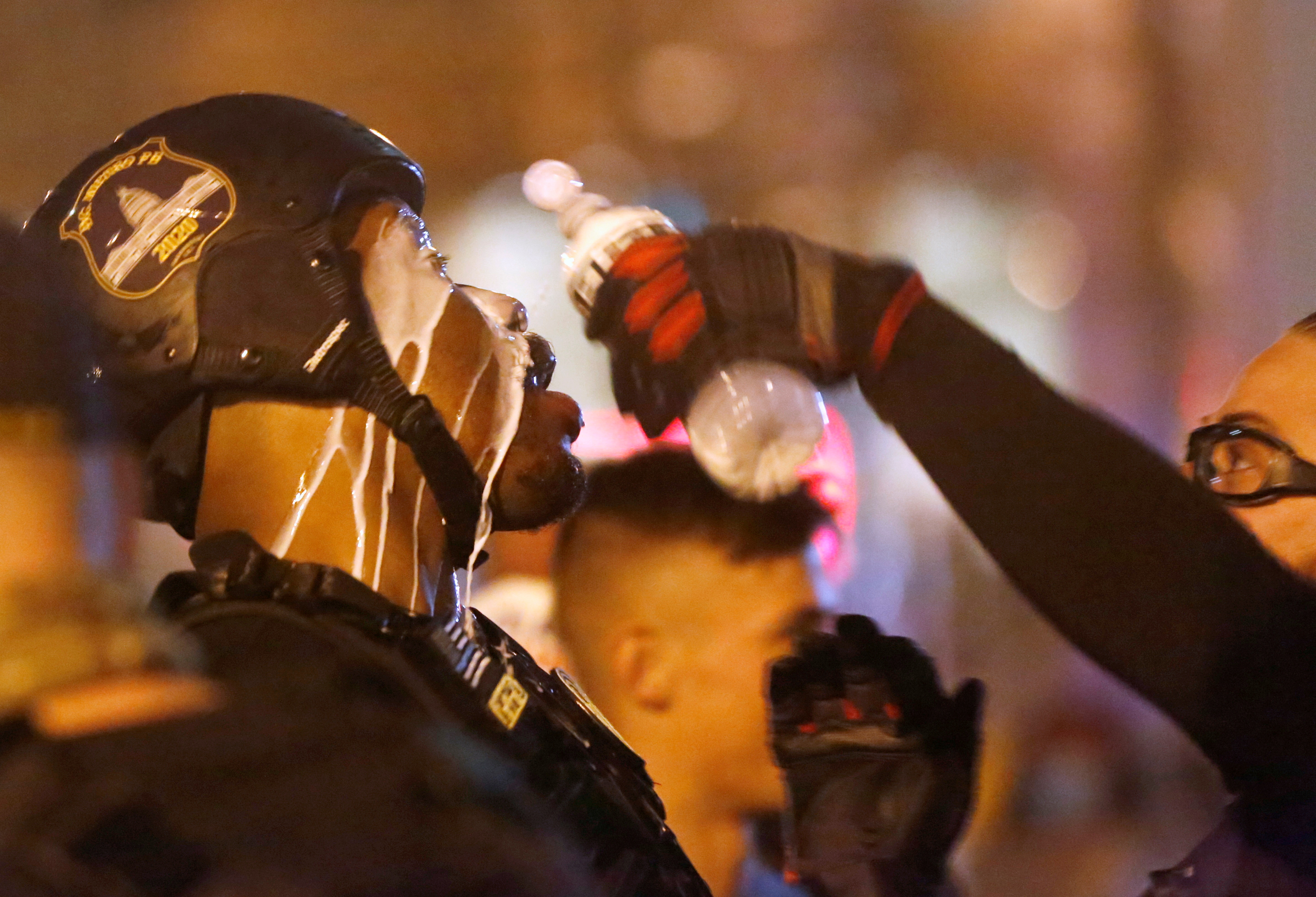 2020-12-13T045417Z_1101615243_RC24MK9GXAWD_RTRMADP_3_USA-ELECTION-TRUMP-PROTEST