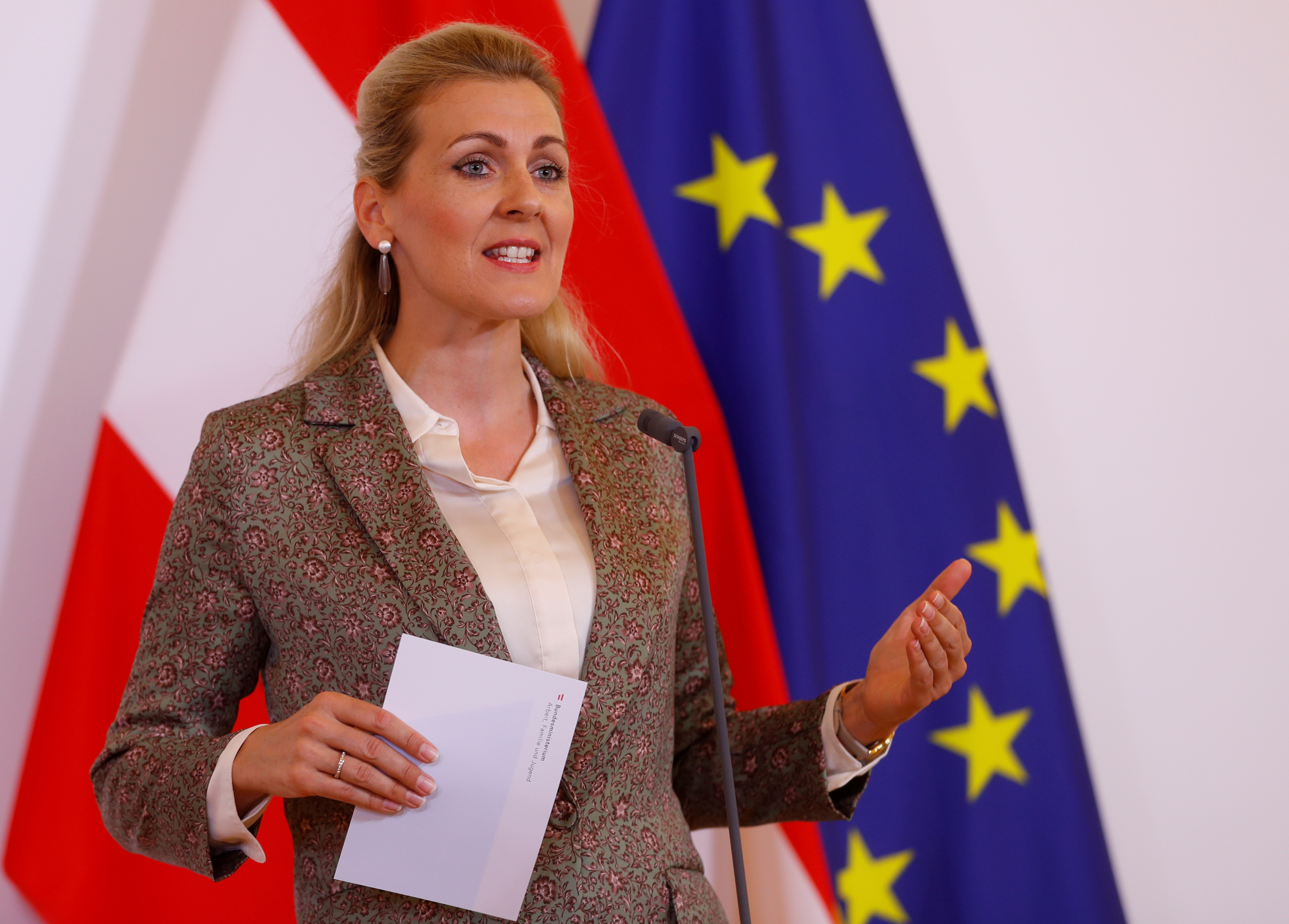 FILE PHOTO: Austrian Family Minister Aschbacher talks to the media in Vienna