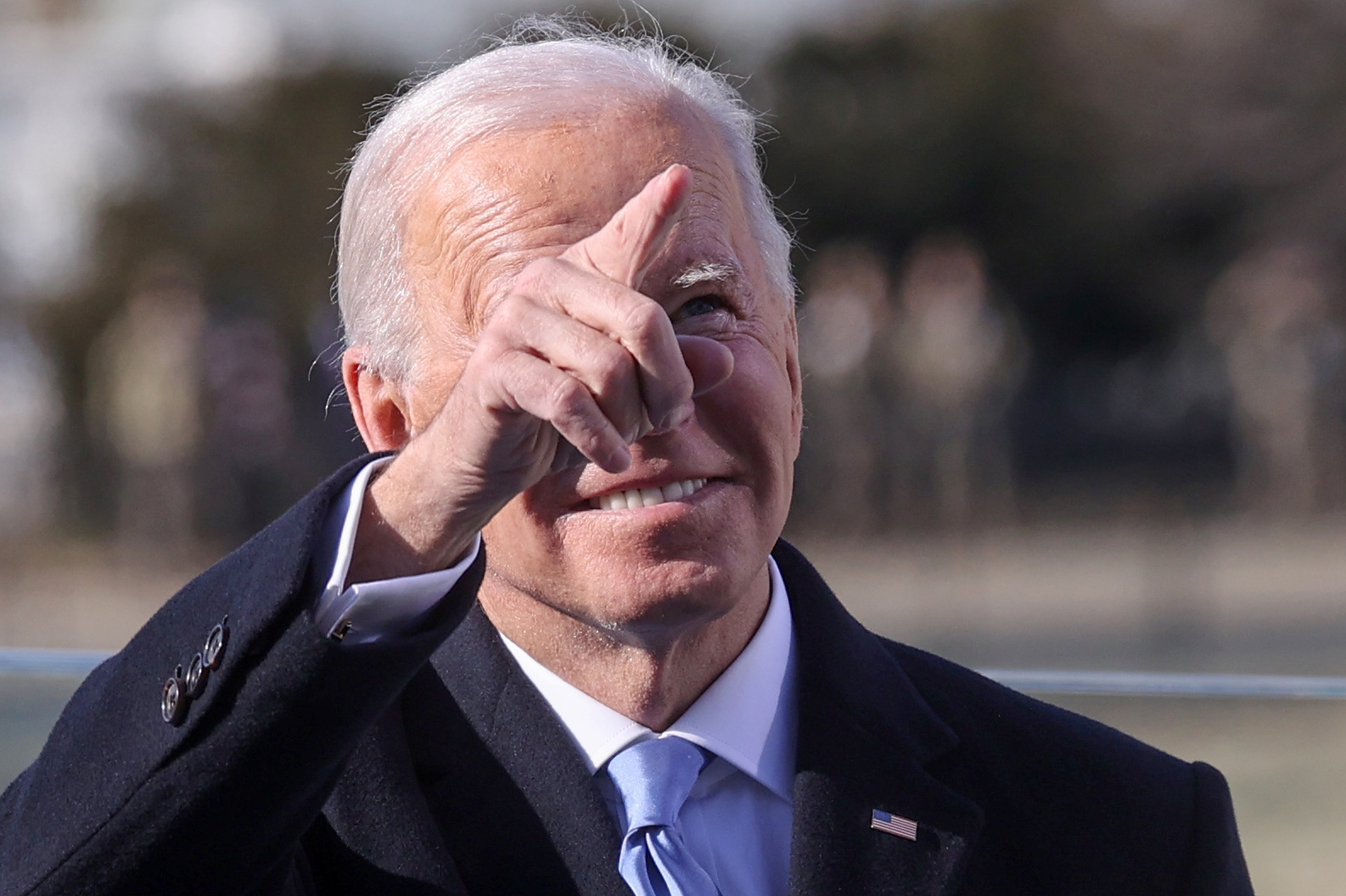 U.S. President Biden looks up into the crowd during his inauguration as the 46th President of the United States on the West Front of the U.S. Capitol in Washington