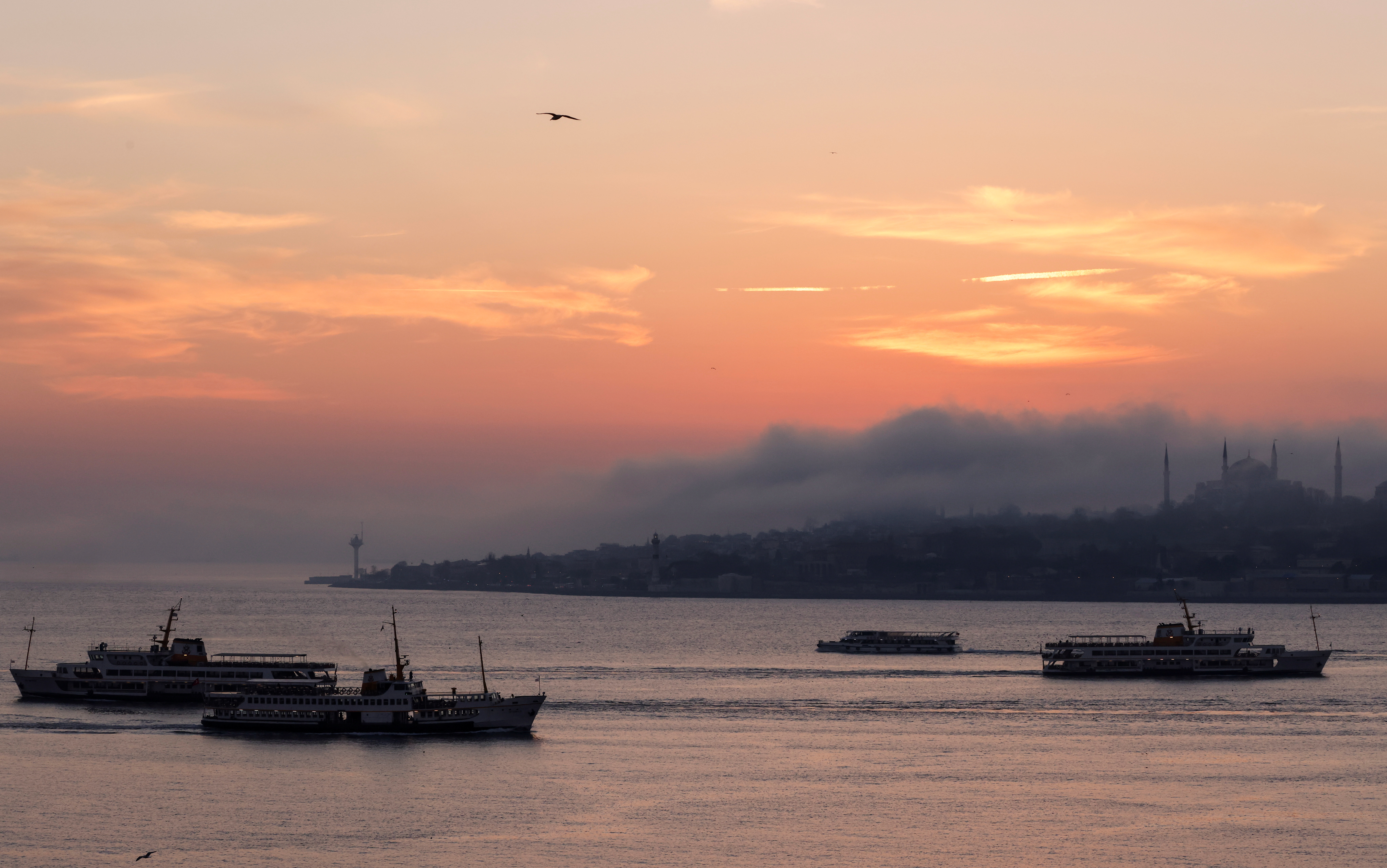 Ferries sail through Bosphorus during a two-day curfew amid the spread of the coronavirus disease (COVID-19) in Istanbul
