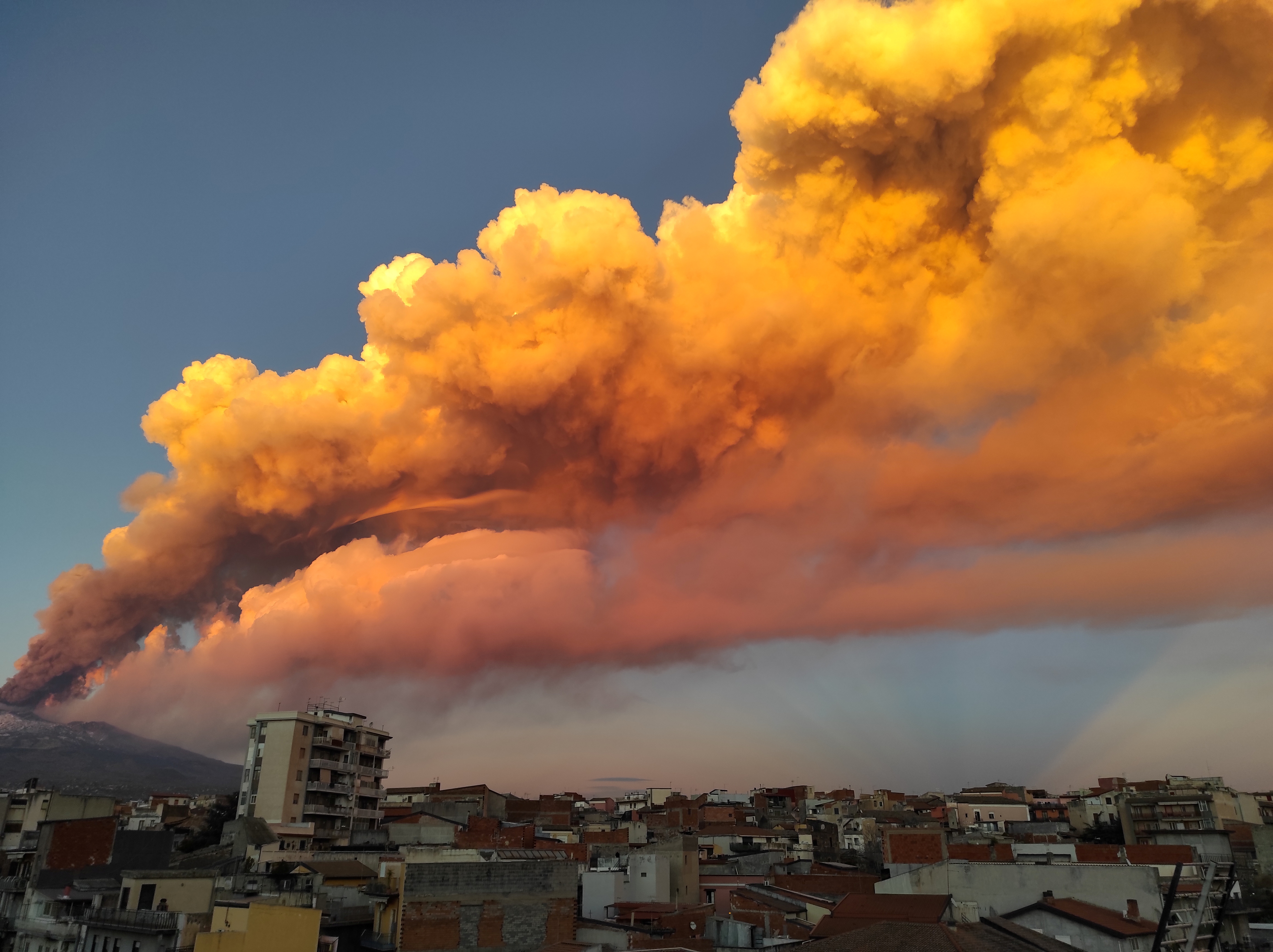 A view of the Mount Etna eruption spewing ash, as seen from Paterno, Italy, in this image obtained from social media