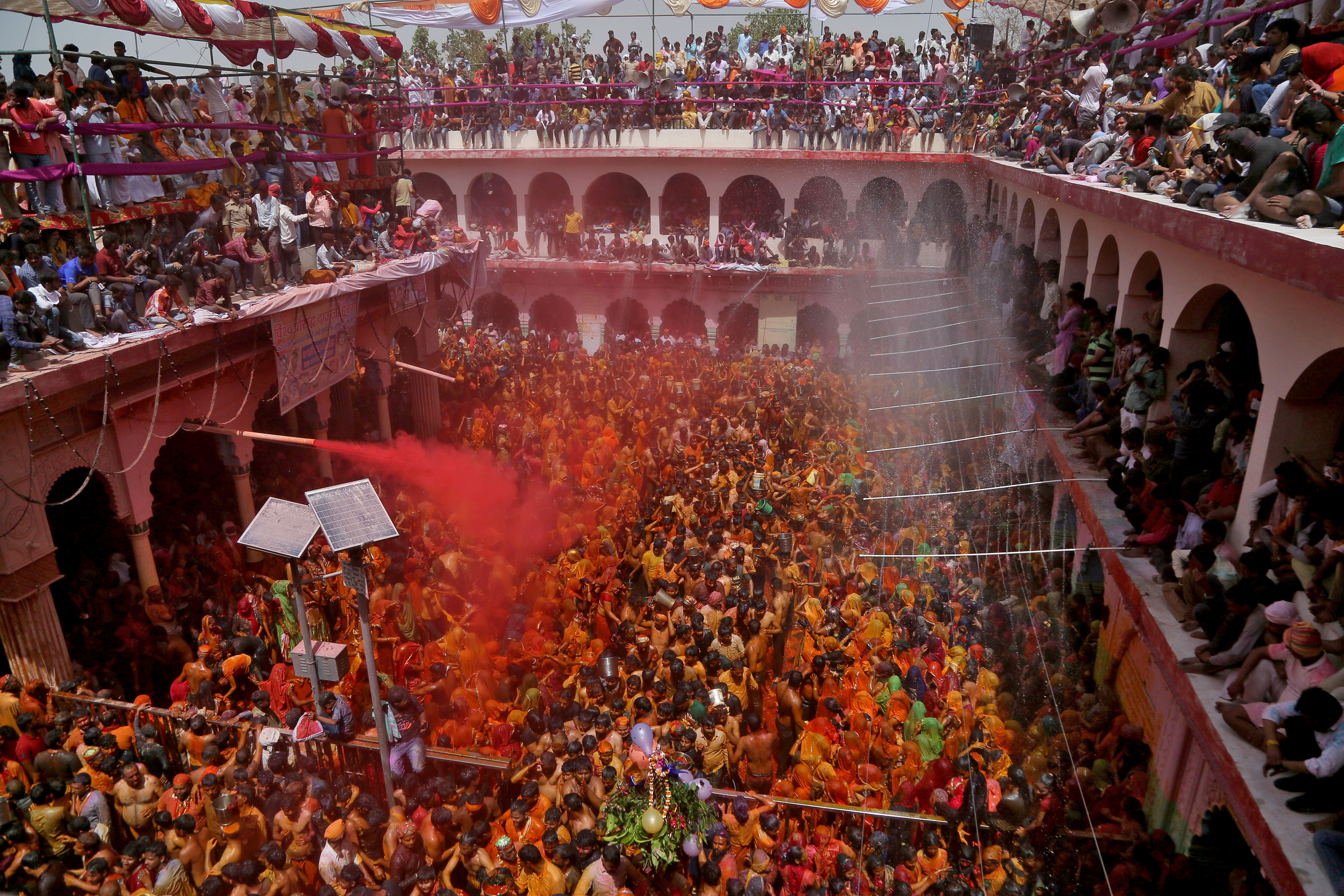 Hindu devotees take part in 'Huranga', at Dauji temple near Mathura