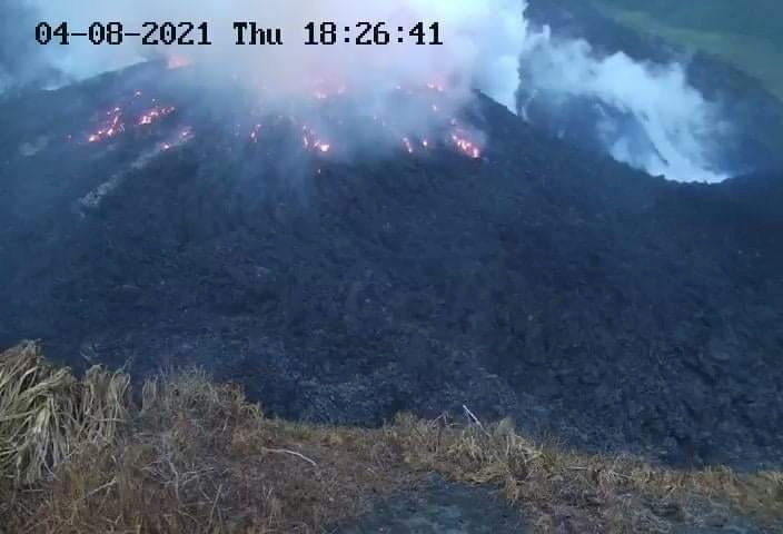 Smoke spews from the glowing dome of the La Soufriere volcano in Saint Vincent and the Grenadines