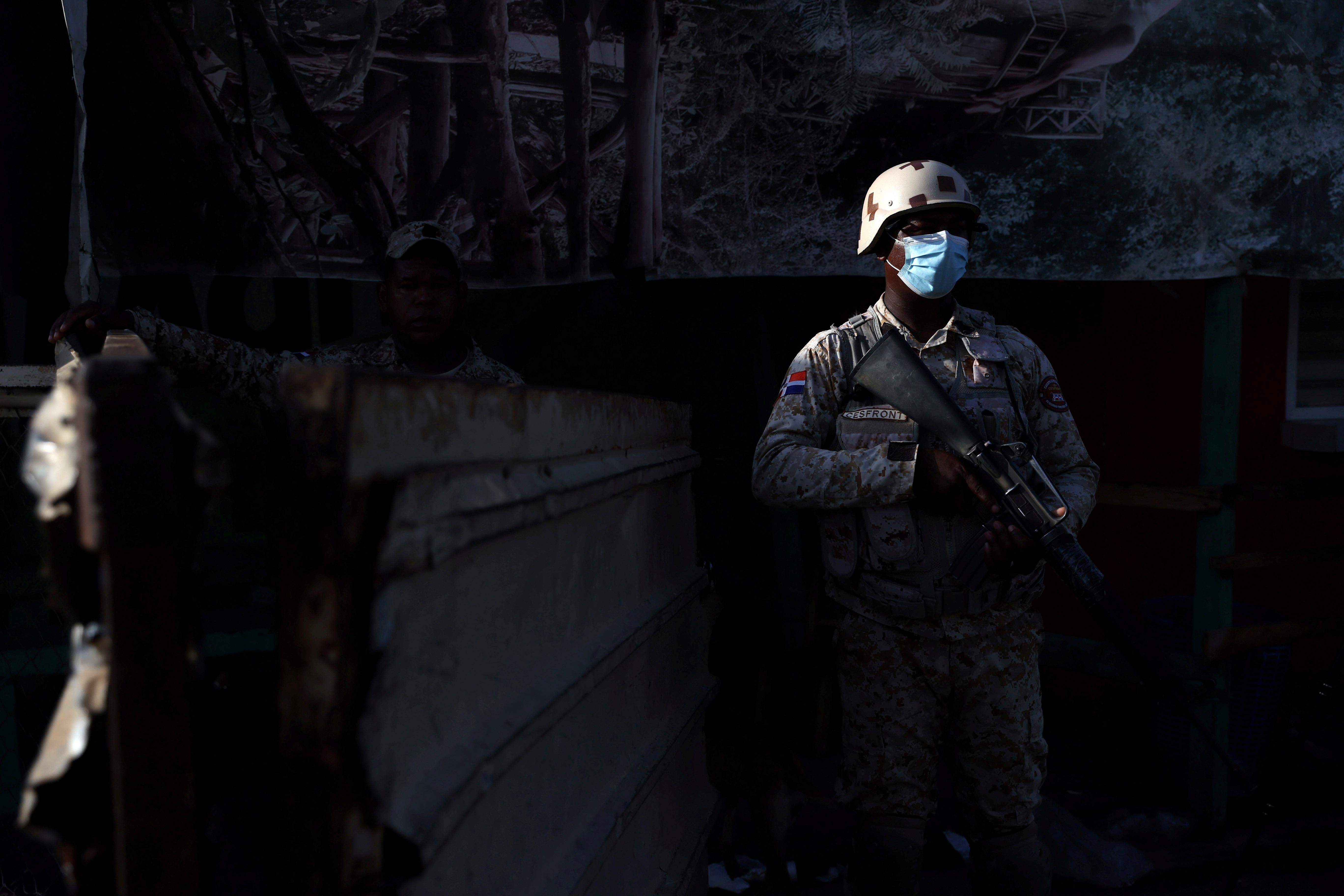 Members of the Dominican Republic's National Army guard the shared border between the Dominican Republic and Haiti, in Dajabon