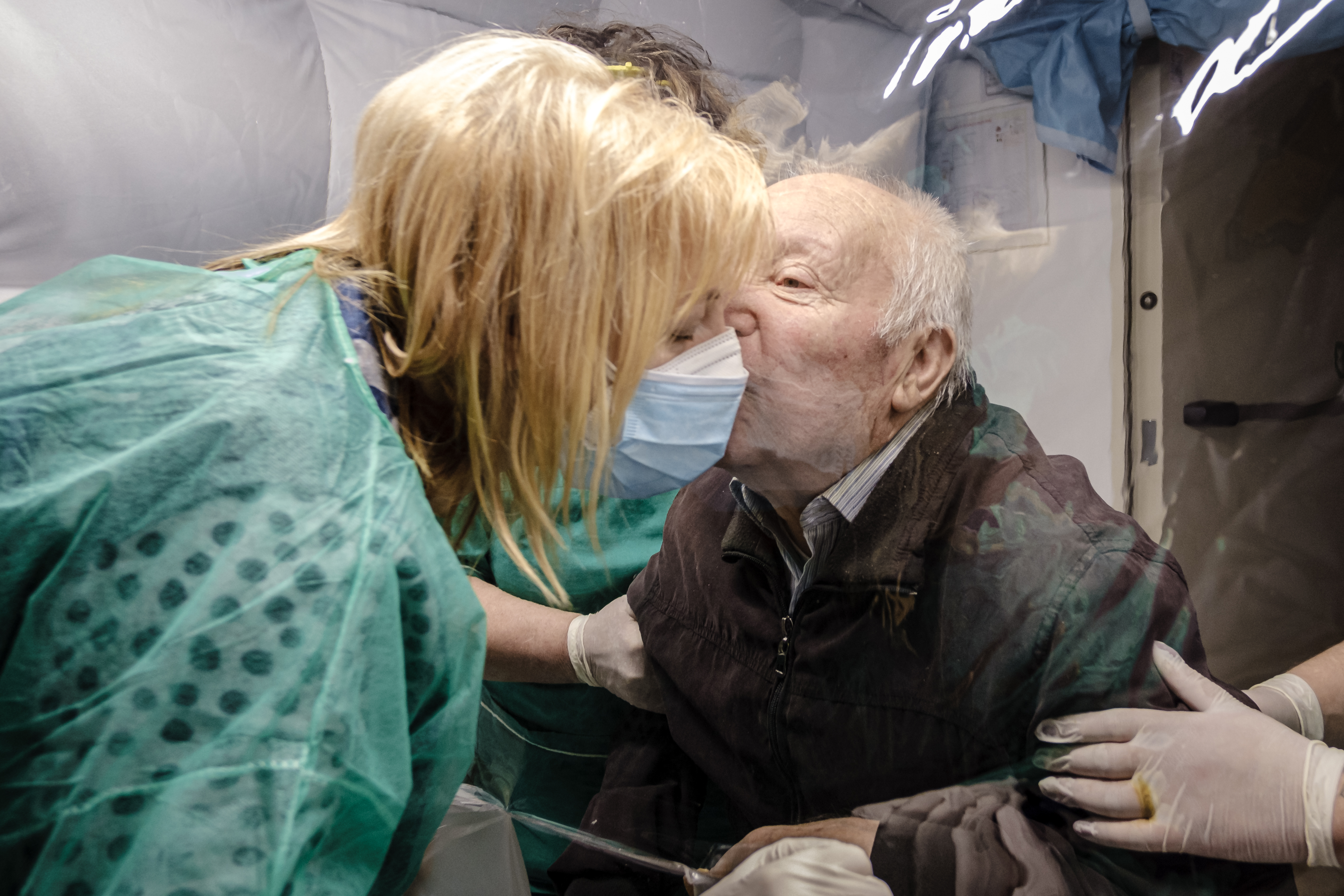 Italy: The "Room of Hugs" in retirement and nursing homes.