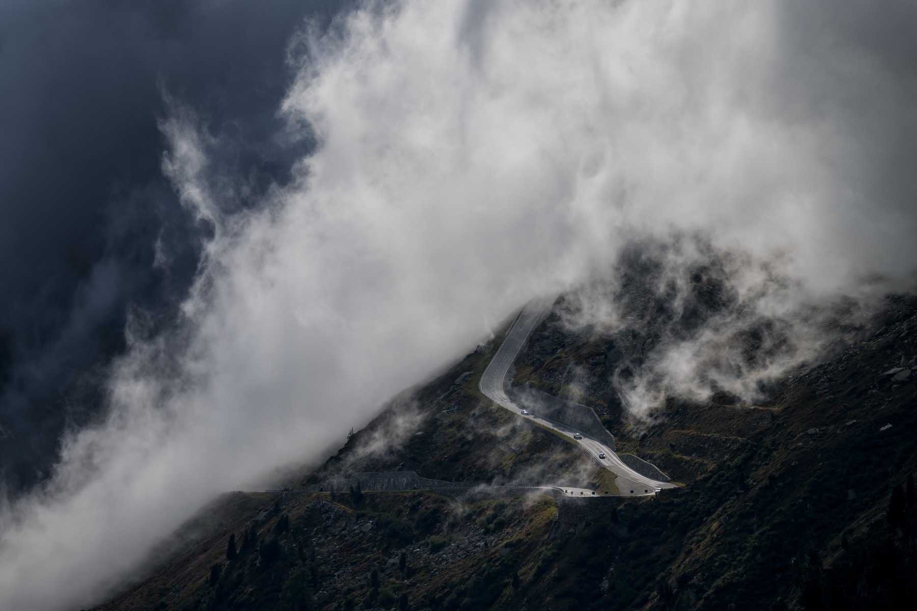 A picture taken on September 12, 2025 shows clouds engulfing the Grimsel Pass, above the village of Gletsch in the Swiss Alps.,Image: 1042350217, License: Rights-managed, Restrictions: , Model Release: no, Credit line: Fabrice COFFRINI / AFP / Profimedia