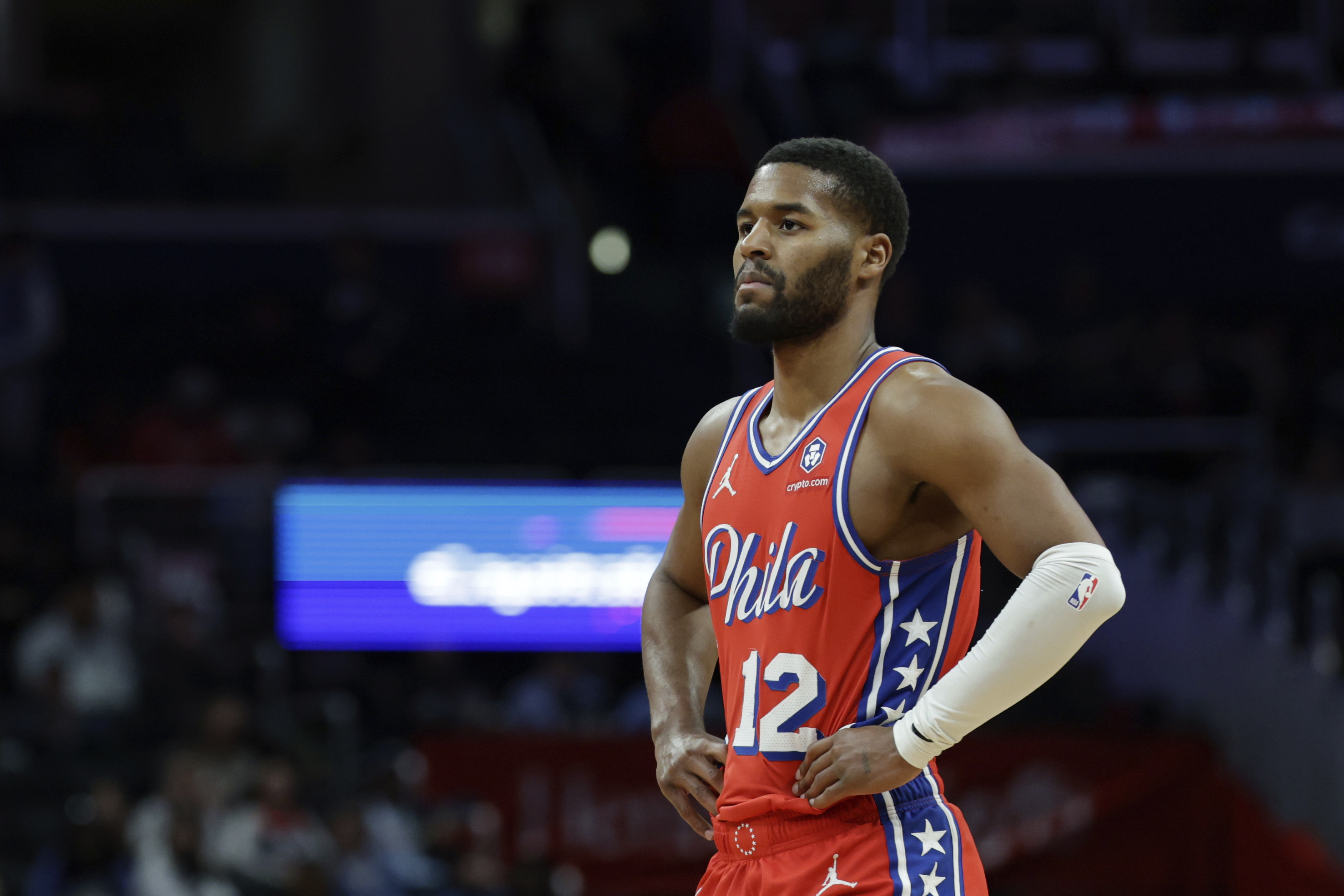 Philadelphia 76ers guard Jared Butler (12) looks on during the second half of an NBA basketball game against the Washington Wizards in Washington, Wednesday, April 9, 2025. (AP Photo/Terrance Williams)