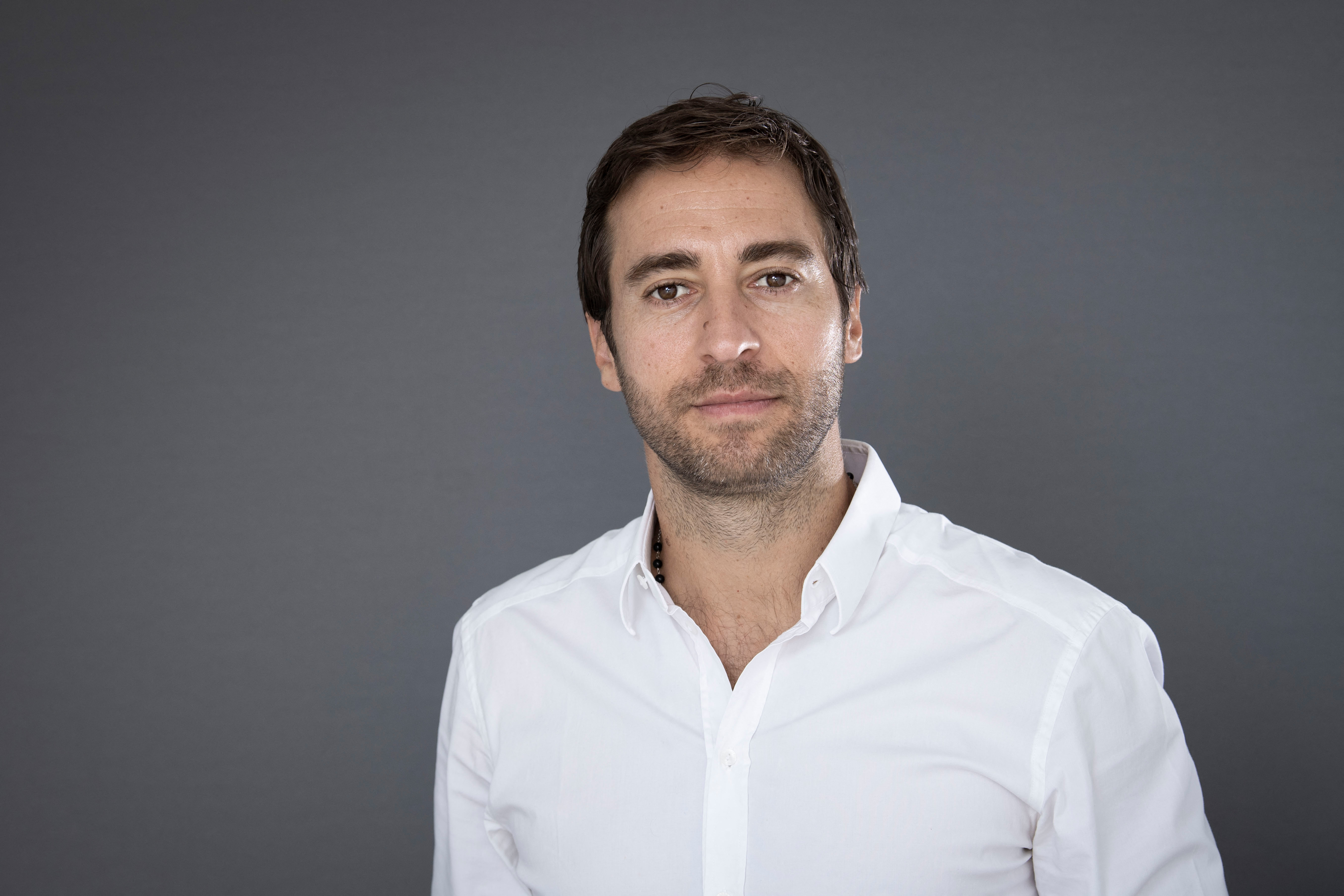GF Biochemical CEO and former french football player Mathieu Flamini poses during a studio photo shoot in Paris on August 30, 2022. (Photo by Alain JOCARD / AFP)