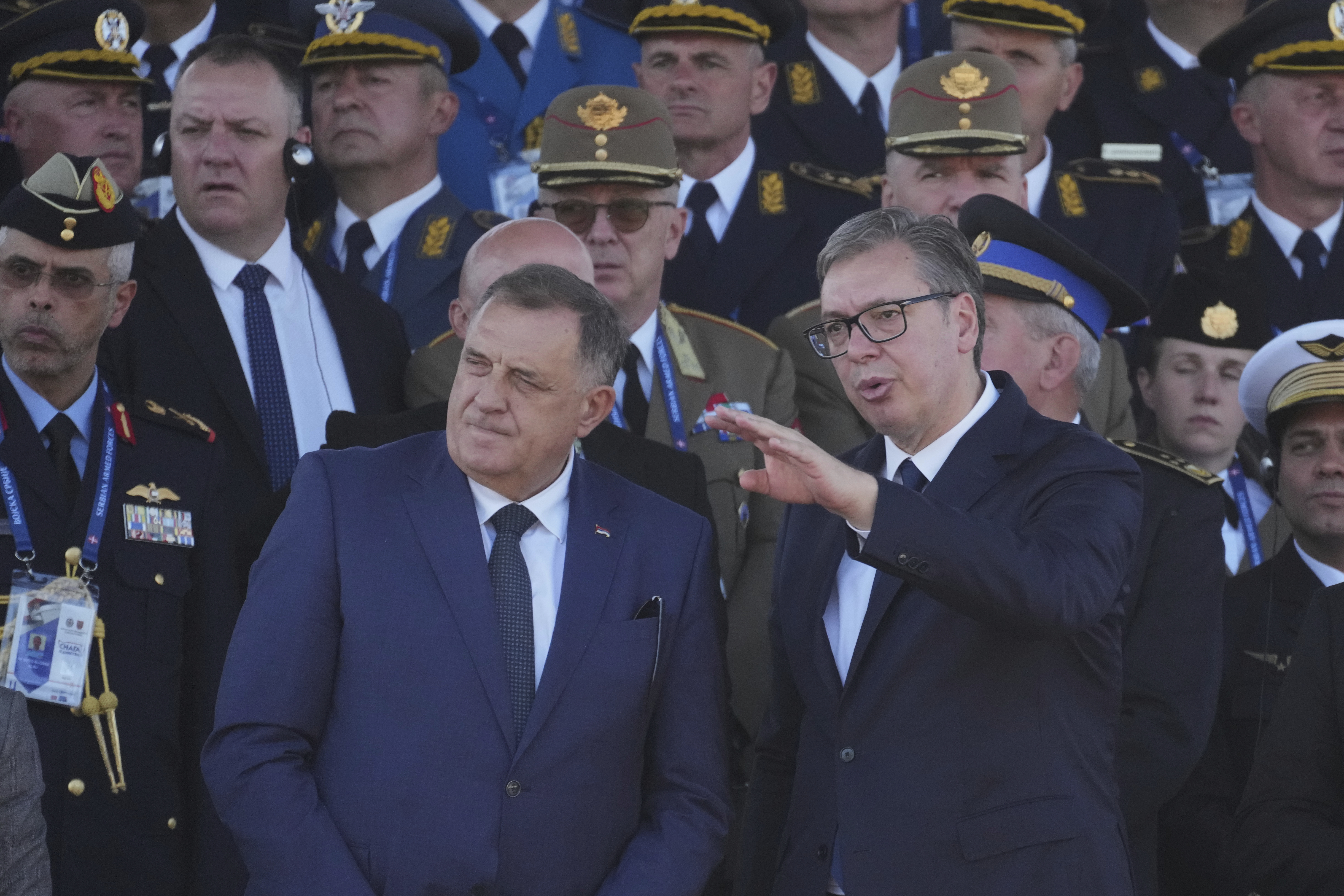 Serbian President Aleksandar Vucic, right, and Bosnian Serb leader Milorad Dodik attend a military parade in Belgrade, Serbia, Saturday, Sept. 20, 2025. (AP Photo/Darko Vojinovic)