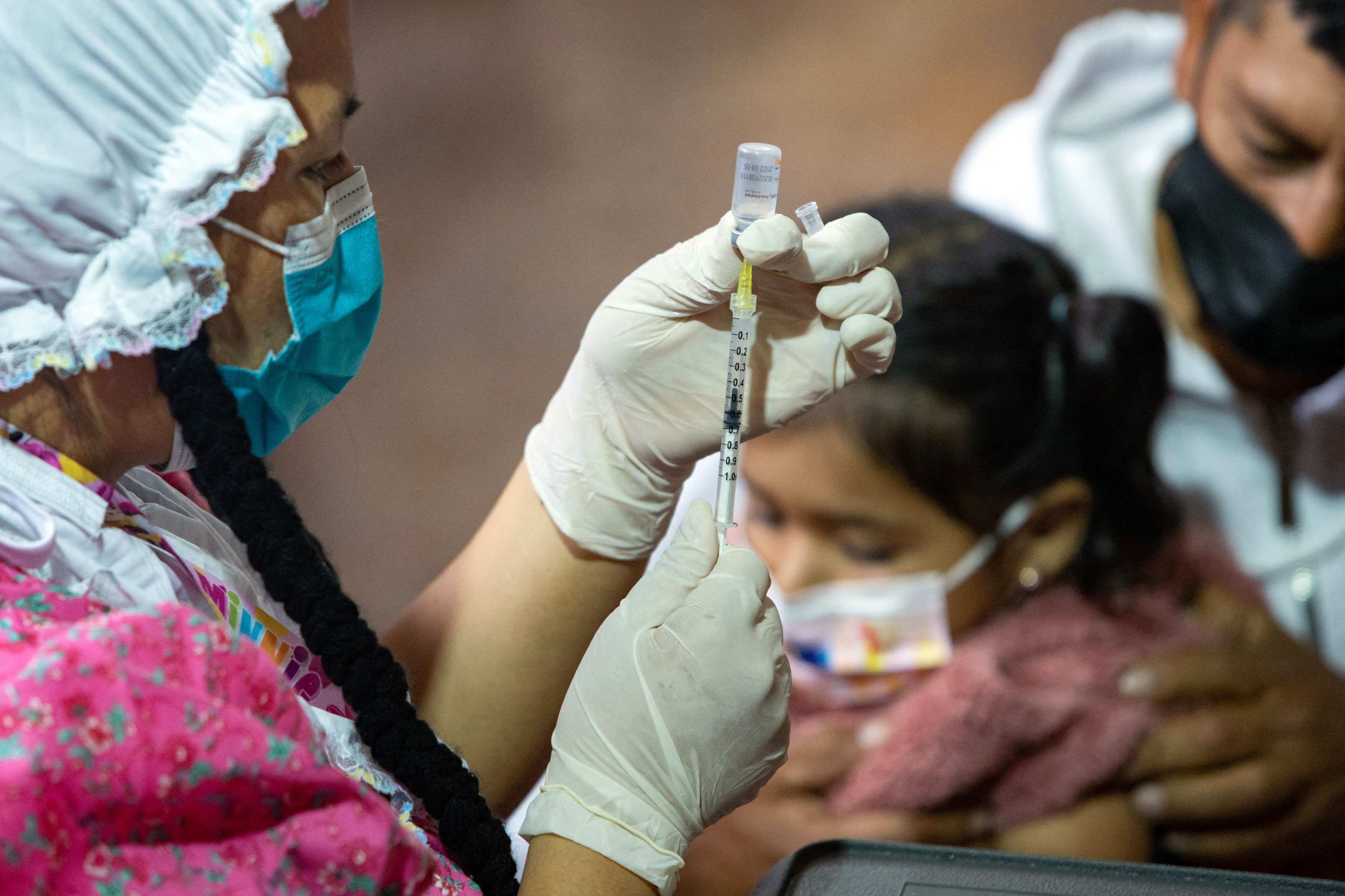 Sinovac vaccine against COVID-19 to inoculate a child in Quito, on February 15, 2022. A vaccination campaign against the coronavirus 662795061, License: Rights-managed, Restrictions: , Model Release: no, Credit line: Cristina Vega RHOR / AFP / Profimedia