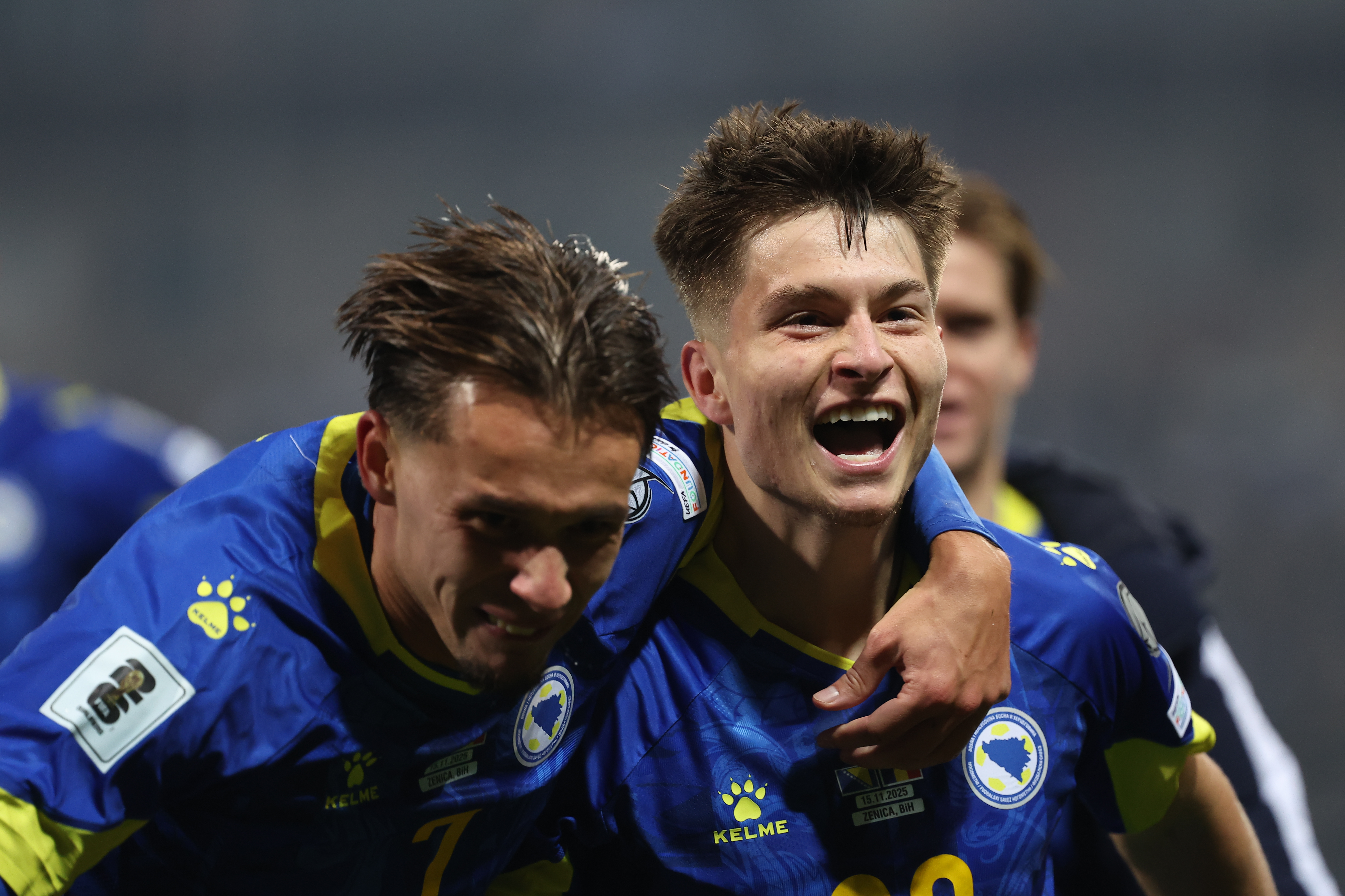 Esmir Bajraktarevic celebrates with teammates after scoring his side's second goal during the 2026 World Cup qualifier soccer match between Bosnia and Romania in Zenica, Bosnia and Herzegovina, Saturday, Nov. 15, 2025. (AP Photo/Armin Durgut)