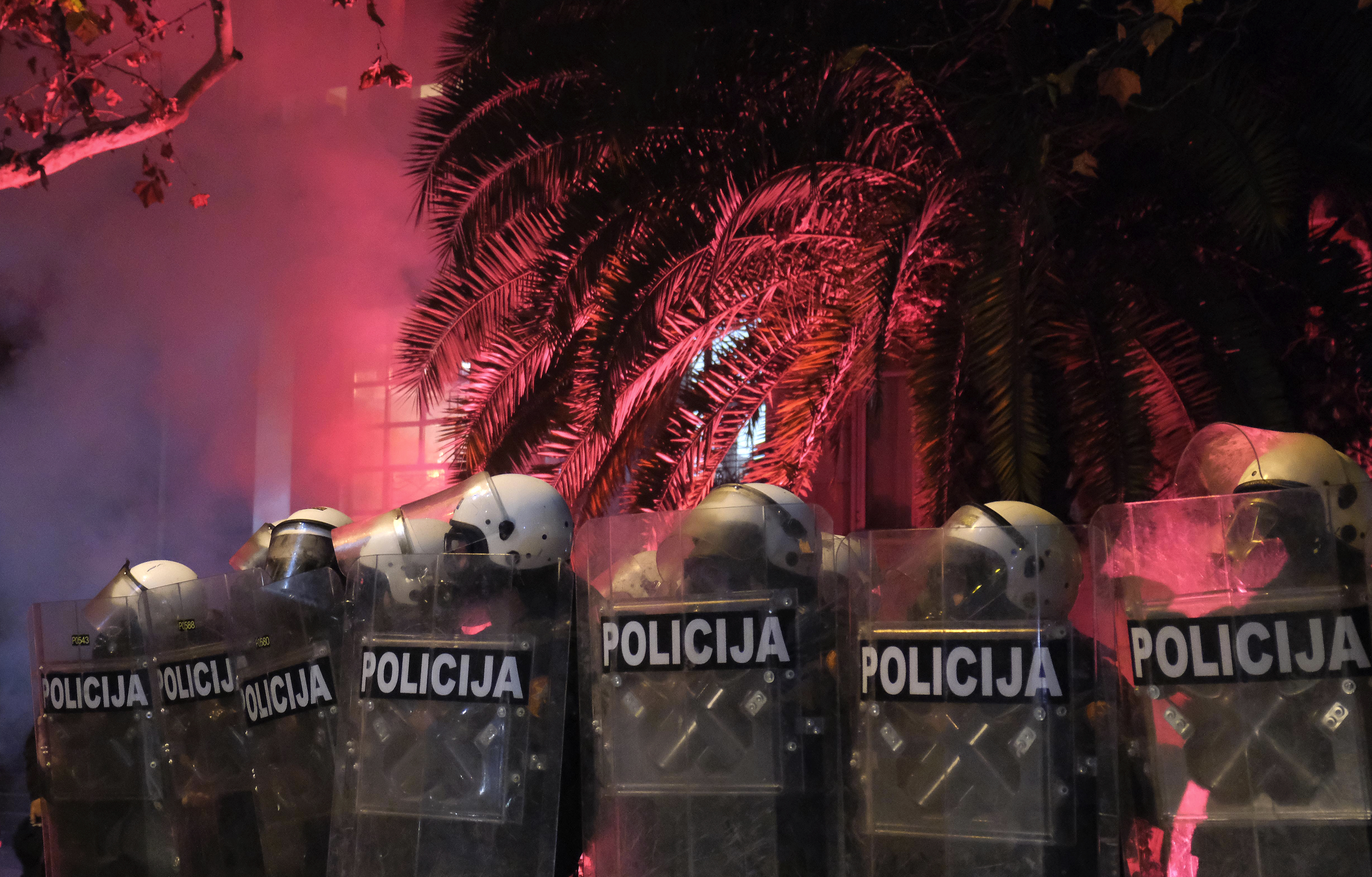 Montenegro riot police guard the parliament building during clashes in Podgorica, Montenegro, Monday, Dec. 12, 2022. Clashes erupted on Monday during an opposition protest in Montenegro reflecting a deep political crisis between the pro-Western and pro-Se