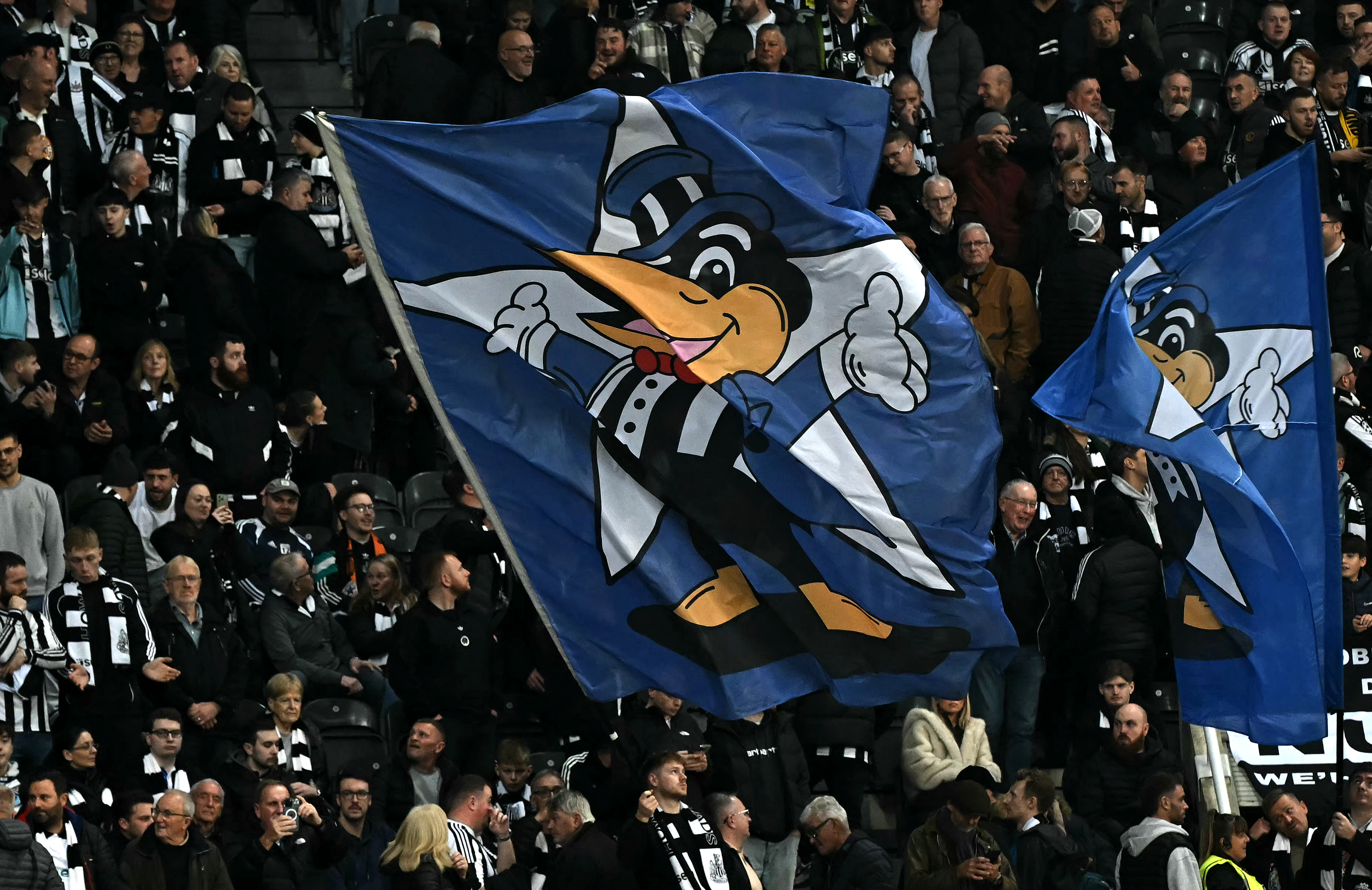 Newcastle fans fly a giant banner ahead of the UEFA Champion's League football match between Newcastle United and Athletic Bilbao at St James' Park in Newcastle-upon-Tyne, north east England on November 4, 2025. (Photo by Paul ELLIS / AFP)