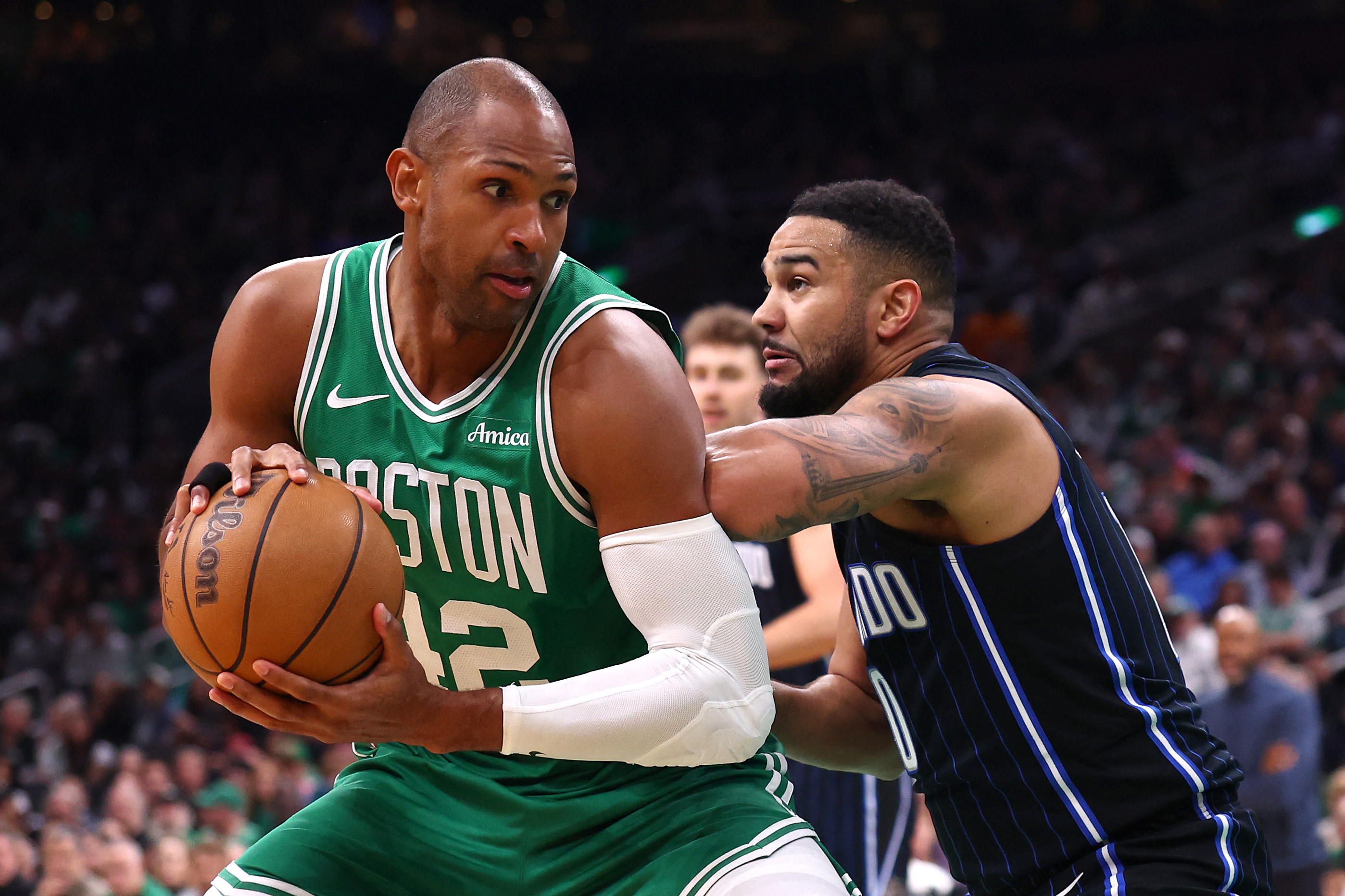 BOSTON, MASSACHUSETTS - APRIL 23: Al Horford #42 of the Boston Celtics controls the ball as Cory Joseph