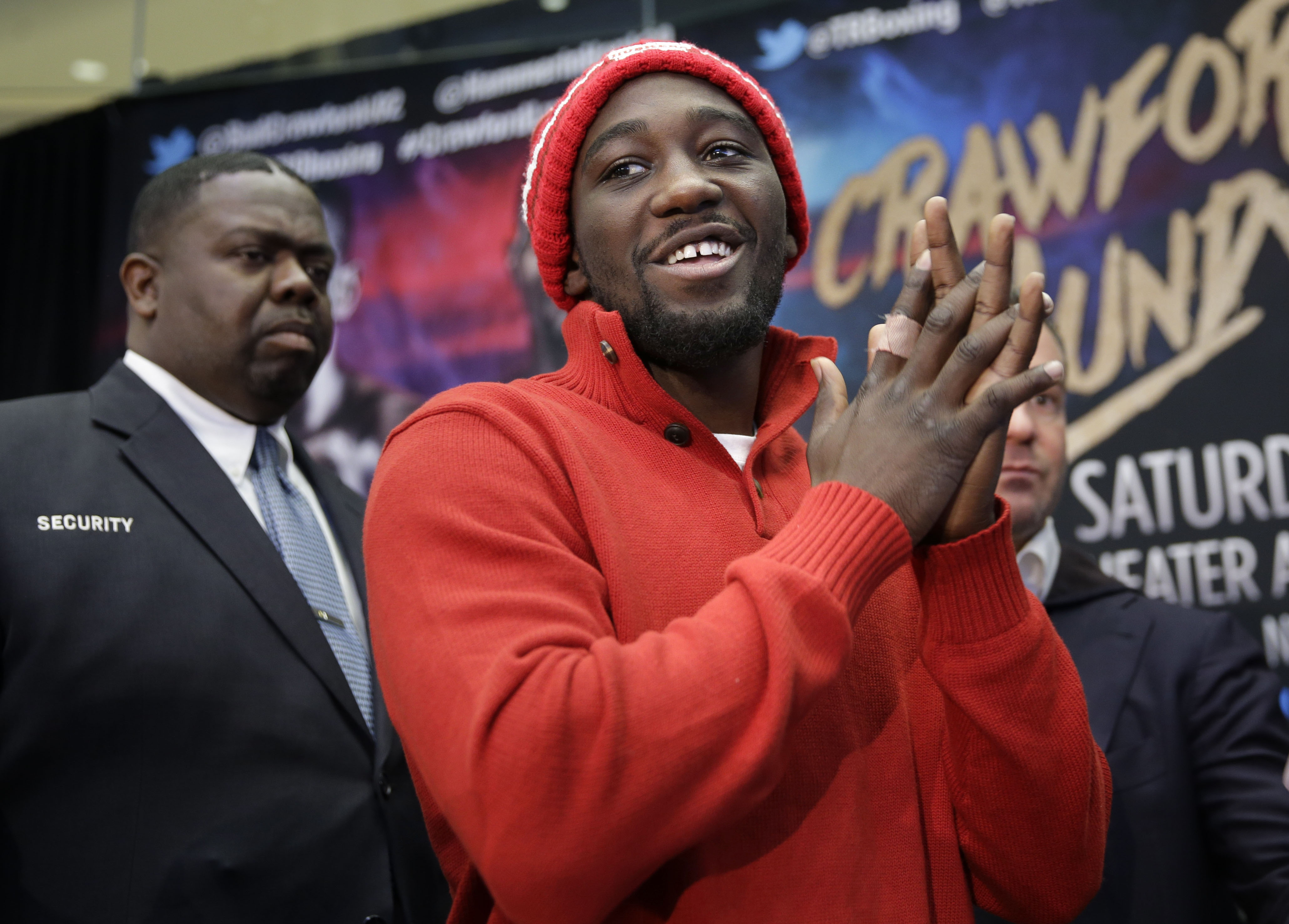 Boxer Terence Crawford smiles during a news conference in New York, Tuesday, Jan. 12, 2016. Crawford will defend his WBO junior welterweight championship belt against Hank Lundy at Madison Square Garden in New York  on Saturday, Feb. 27, 2016. (AP Photo/S