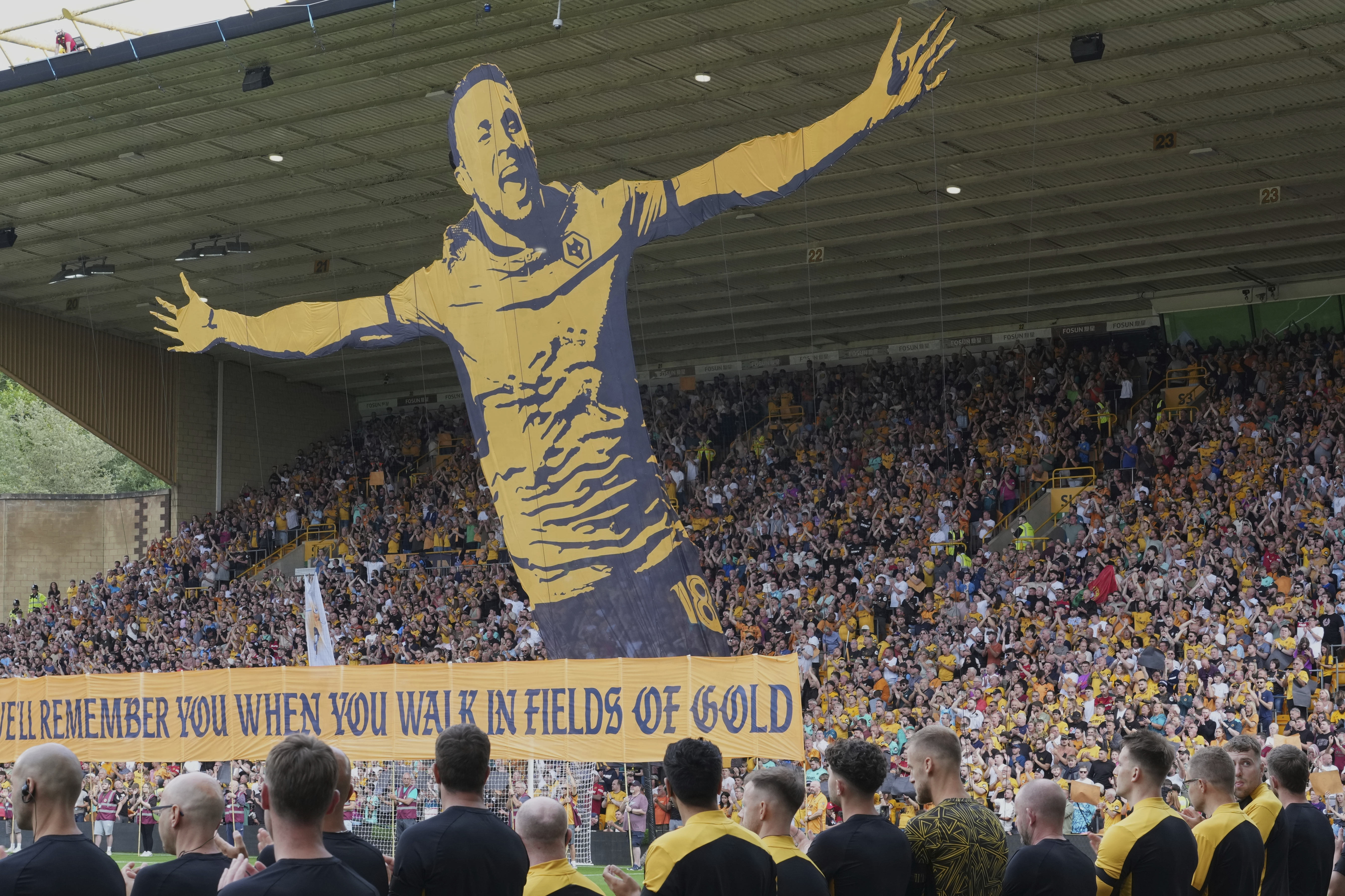 Fans pay a tribute to late Liverpool player Diogo Jota ahead of the English Premier League soccer match between Wolverhampton Wanderers and Manchester City at Molineux Stadium, Wolverhampton, England, Saturday, Aug. 16, 2025. (AP Photo/Dave Shopland)