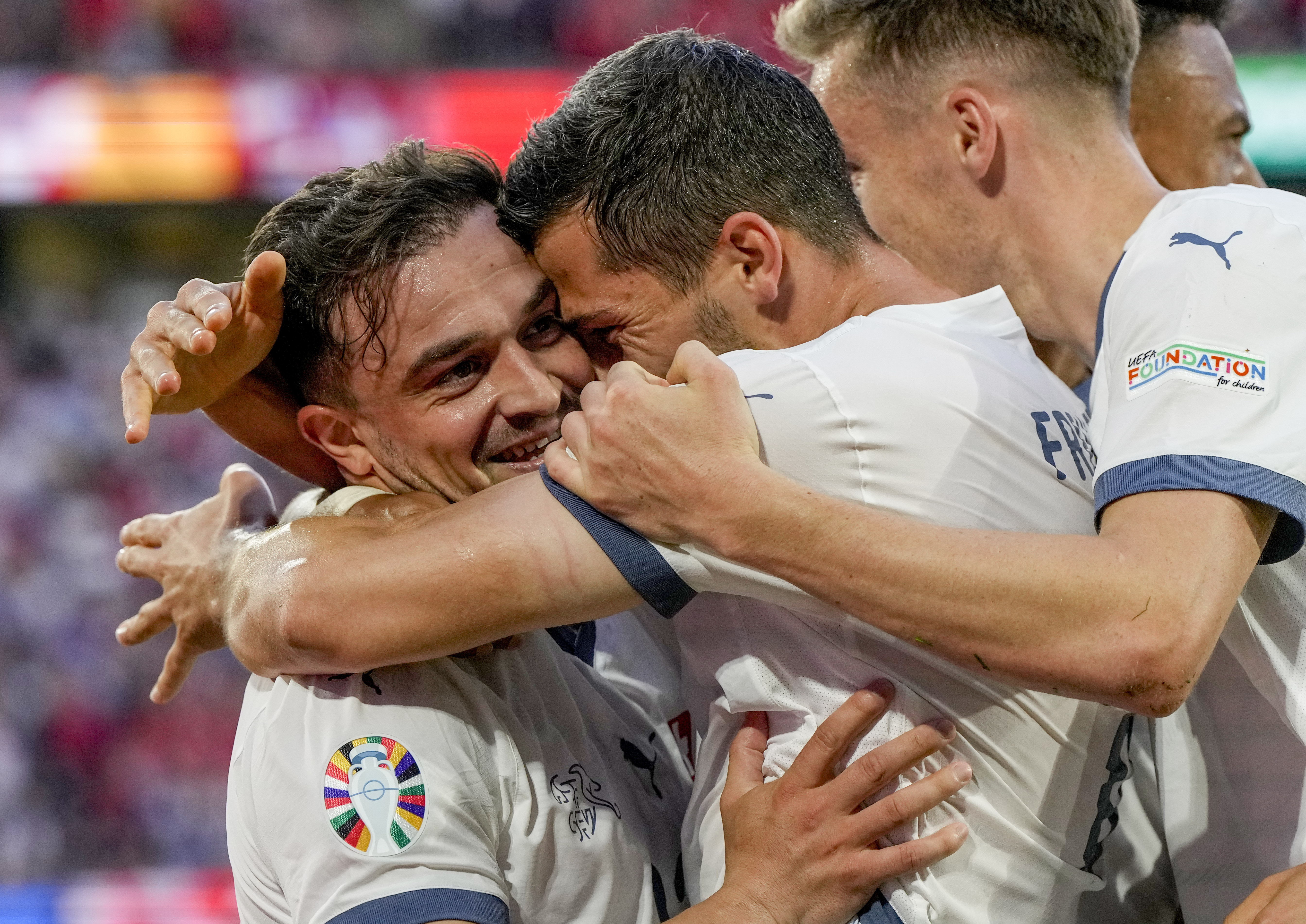 Switzerland's Xherdan Shaqiri celebrates his side's equalising goal during a Group A match between Scotland and Switzerland at the Euro 2024 soccer tournament in Cologne, Germany, Wednesday, June 19, 2024. (AP Photo/Martin Meissner)