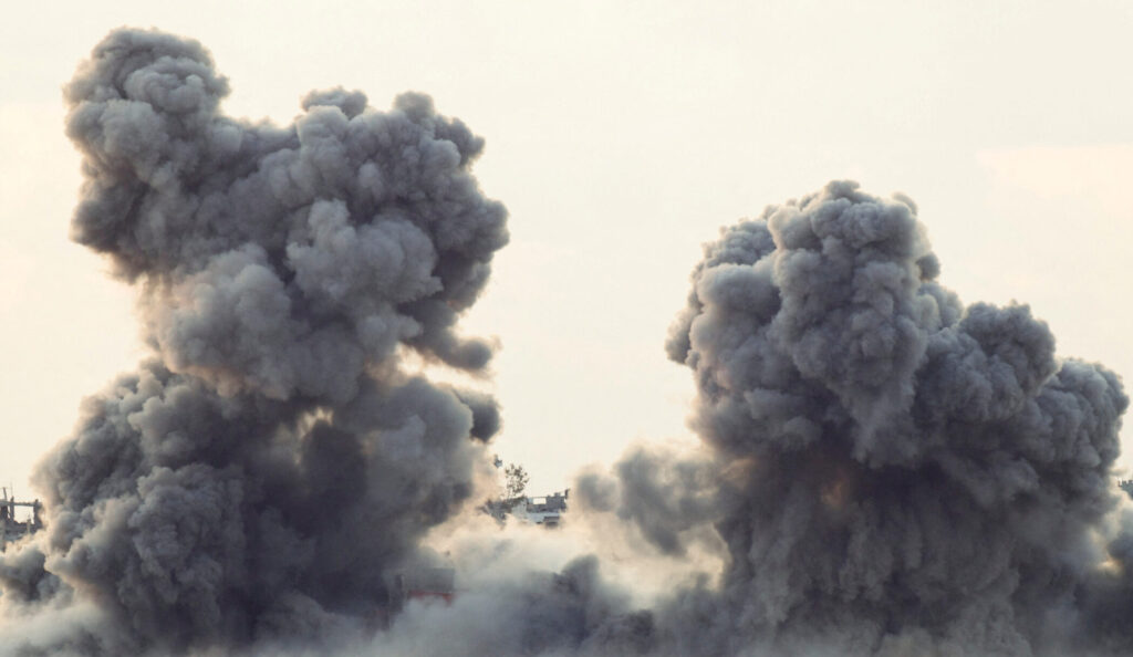 Smoke rises from Gaza after an explosion