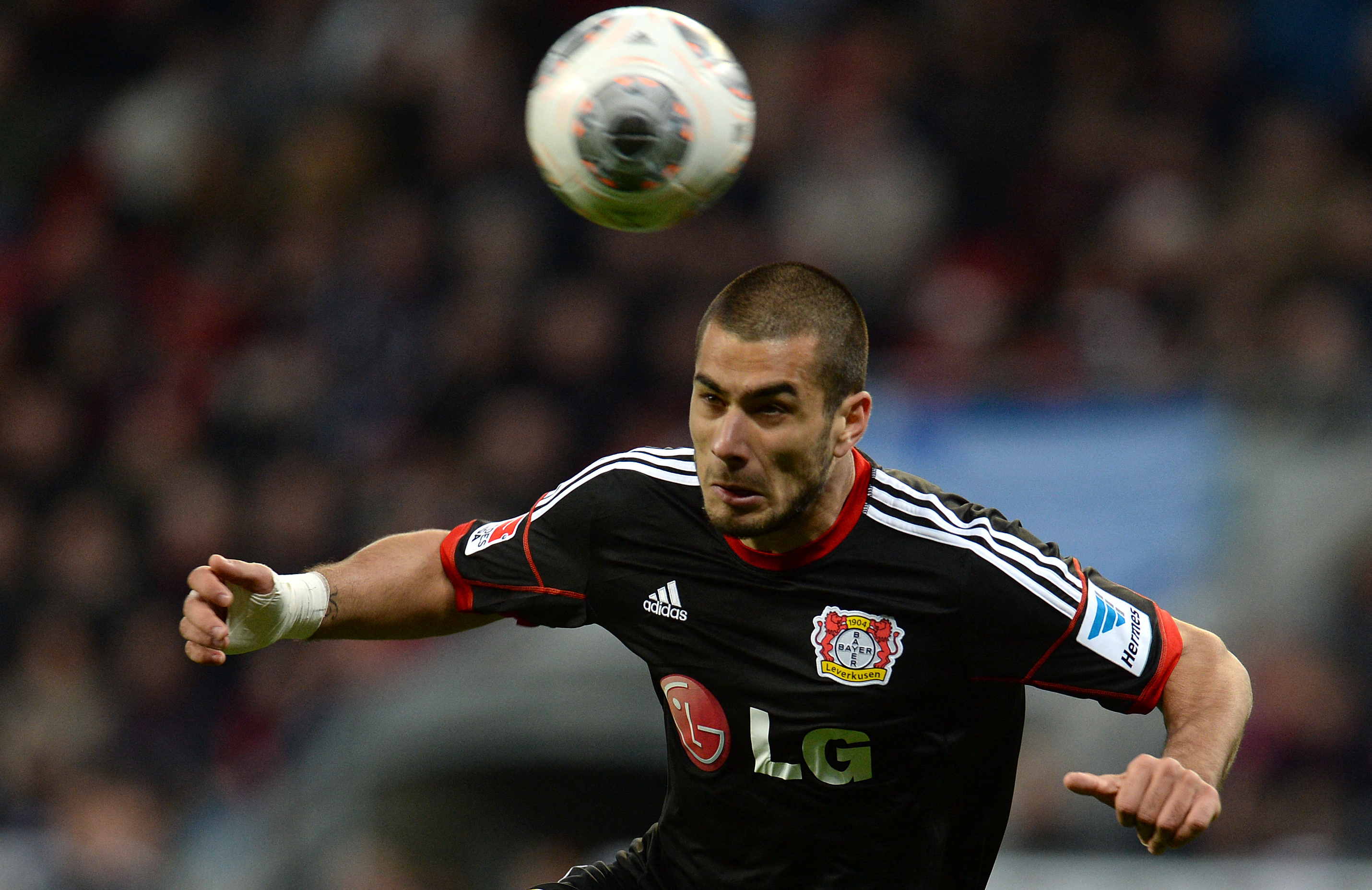 Leverkusen's Swiss striker Eren Derdiyok plays the ball during the German first division Bundesliga football match Bayer Leverkusen vs 1899 Hoffenheim in Leverkusen, western Germany, on March 23, 2014.