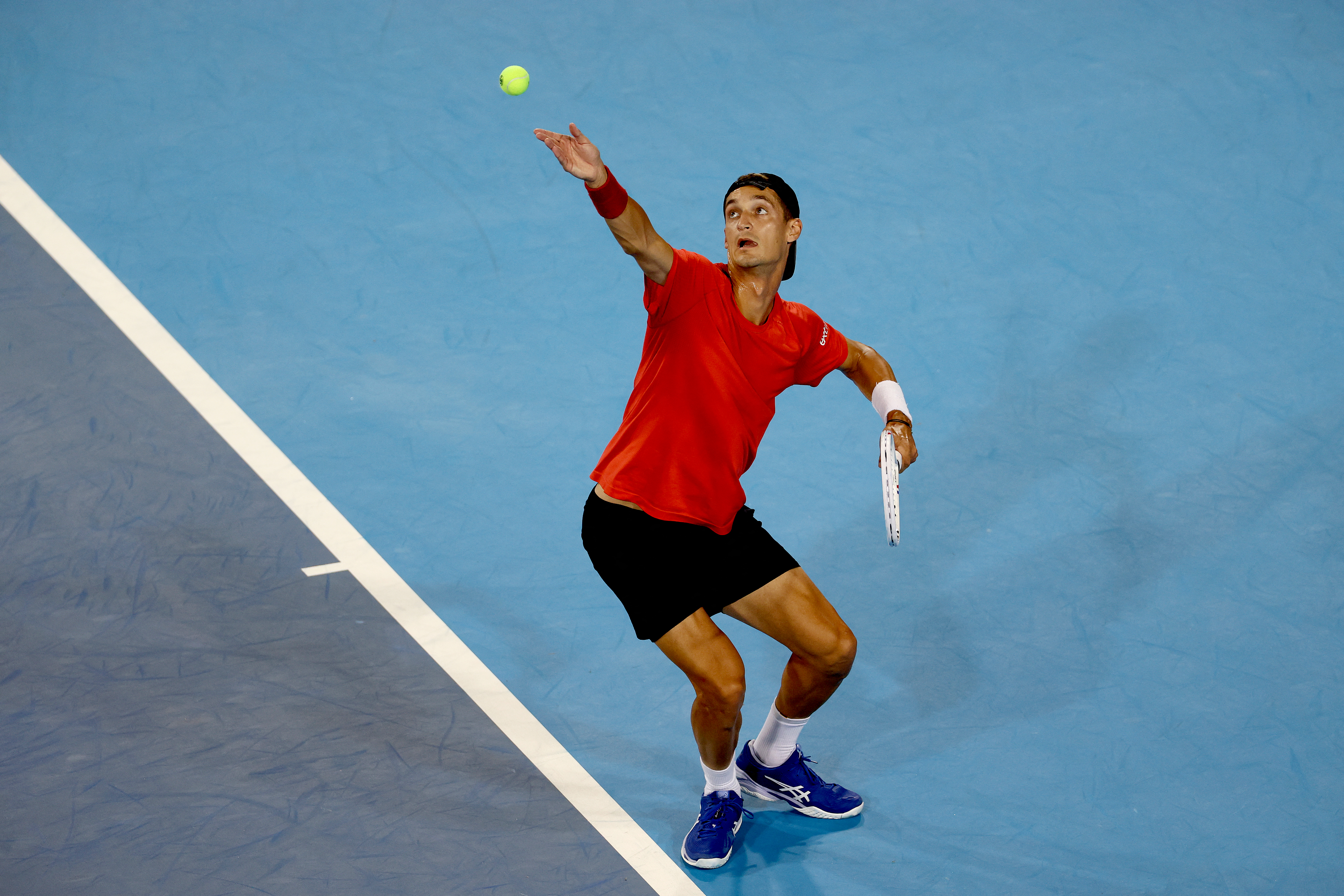 MASON, OHIO - AUGUST 14: Terence Atmane of France serves to Holger Rune