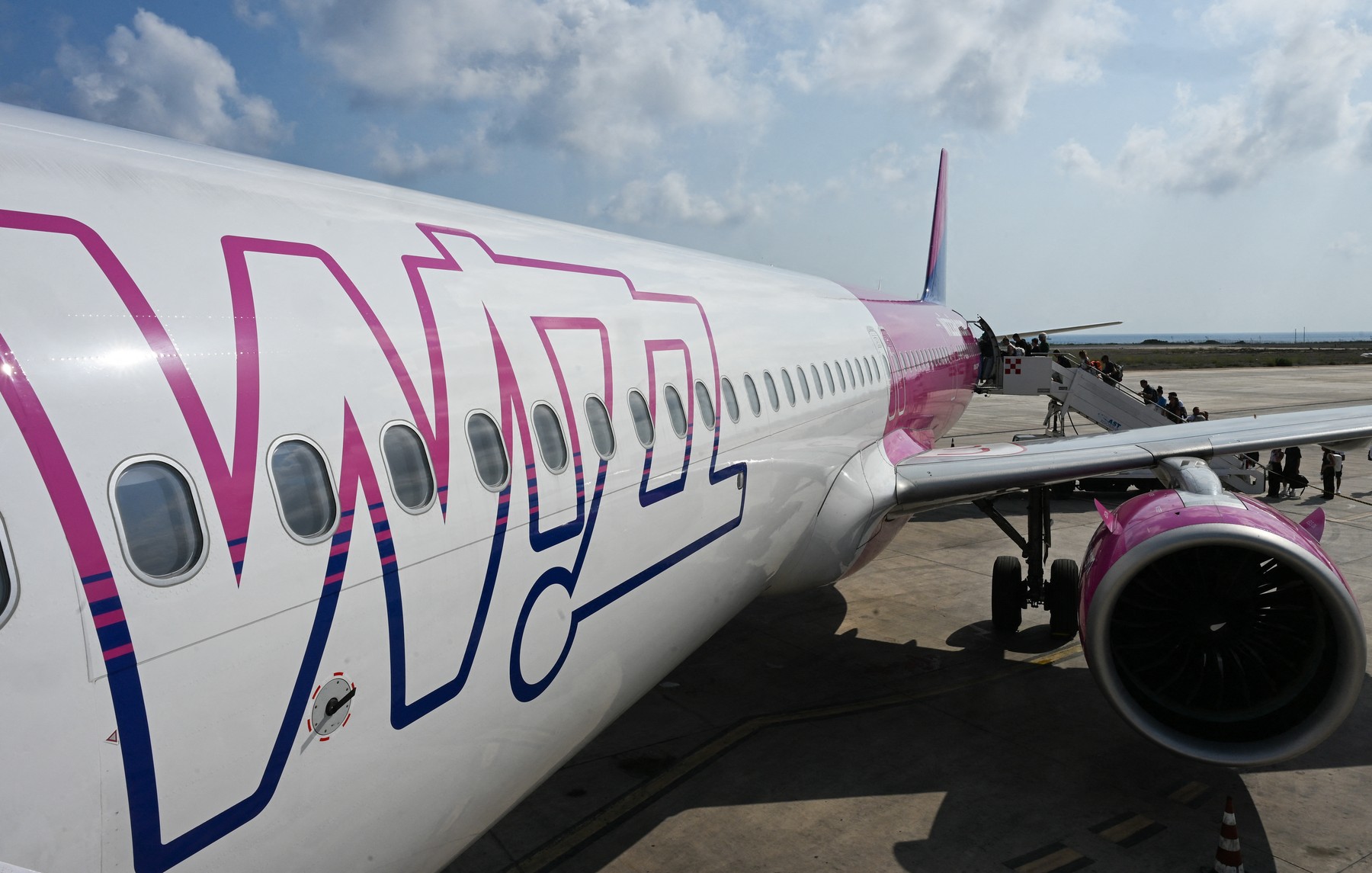 This photograph shows a Wizz air jet on the tarmac of at the Lampedusa airport, Stefano RELLANDINI / AFP / Profimedia