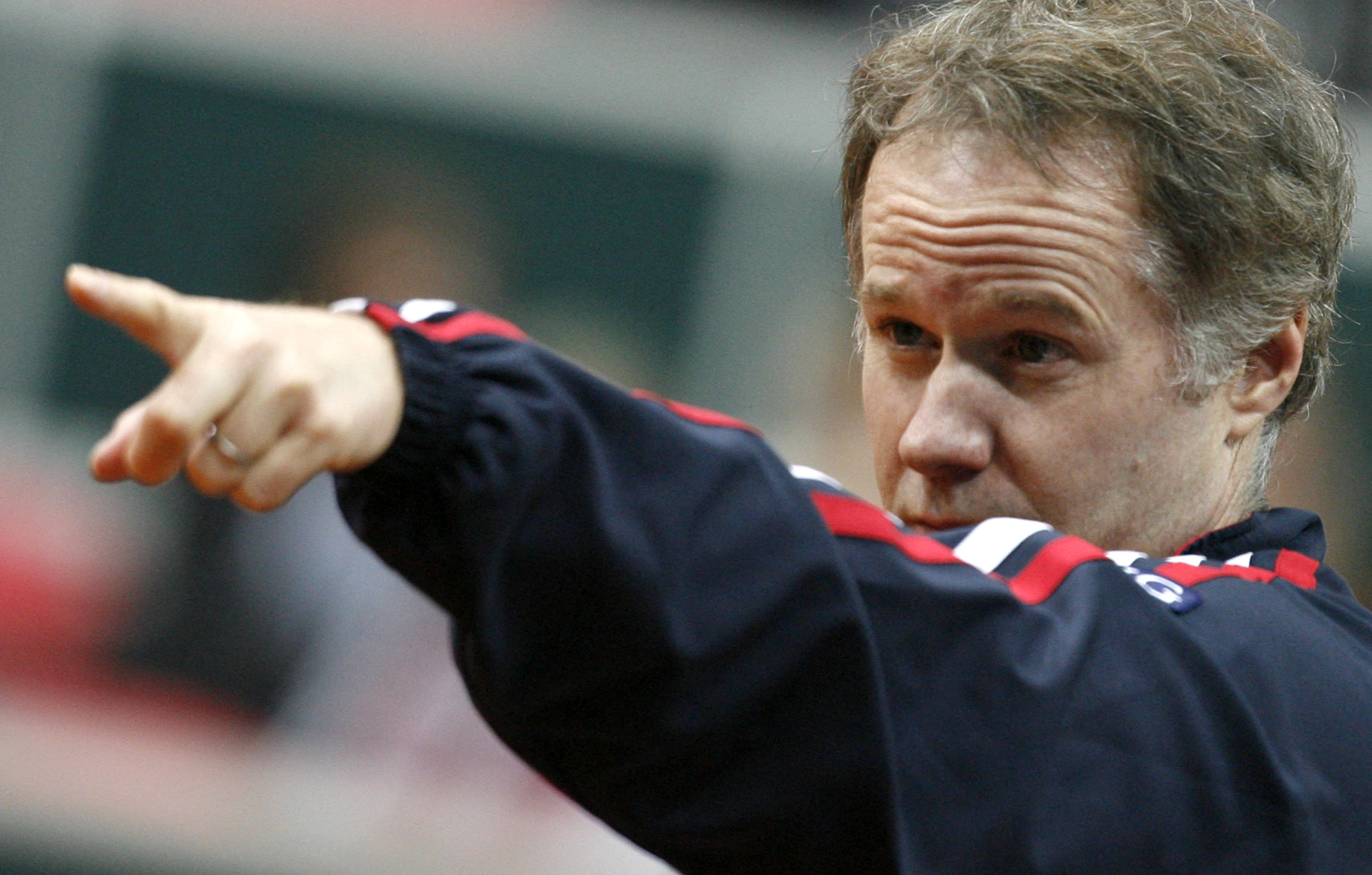 US Davis cup captain Patrick McEnroe conducts his player  Andy Roddick of US during a Davis cup match between the Czech Republic and US in Ostrava 11 February .AFP PHOTO/JOE KLAMAR (Photo by JOE KLAMAR / AFP)