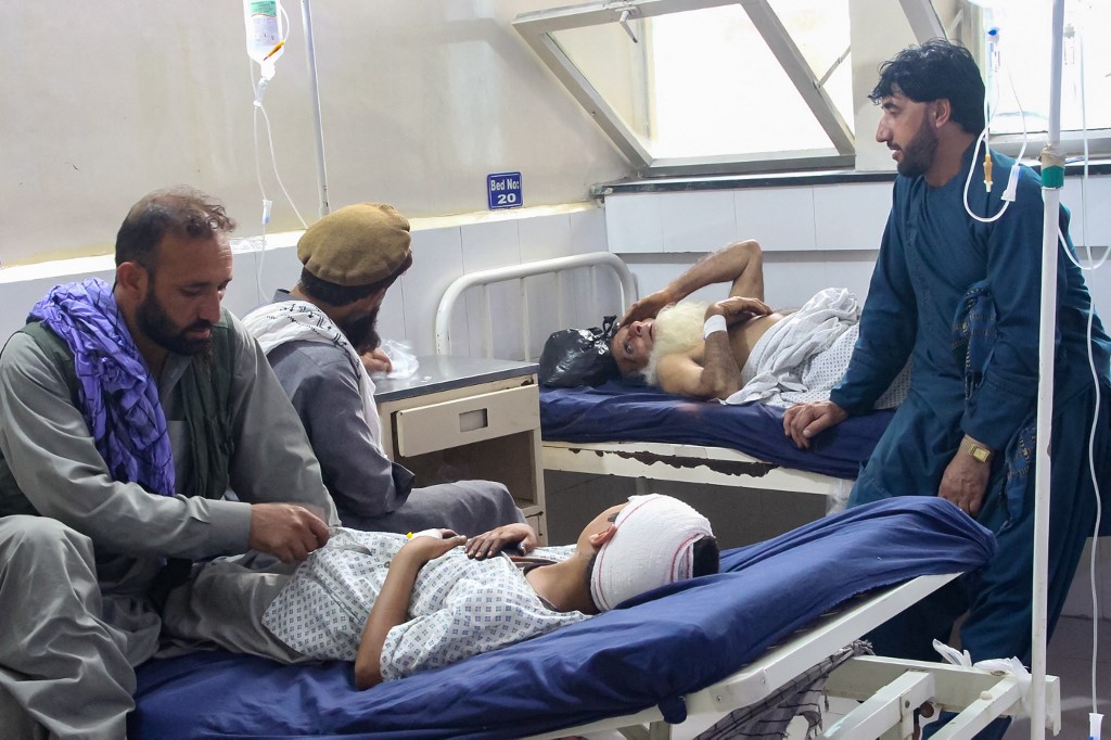 Injured Afghan people receive treatment at a hospital after an earthquake in Afghanistan's Jalalabad on September 1