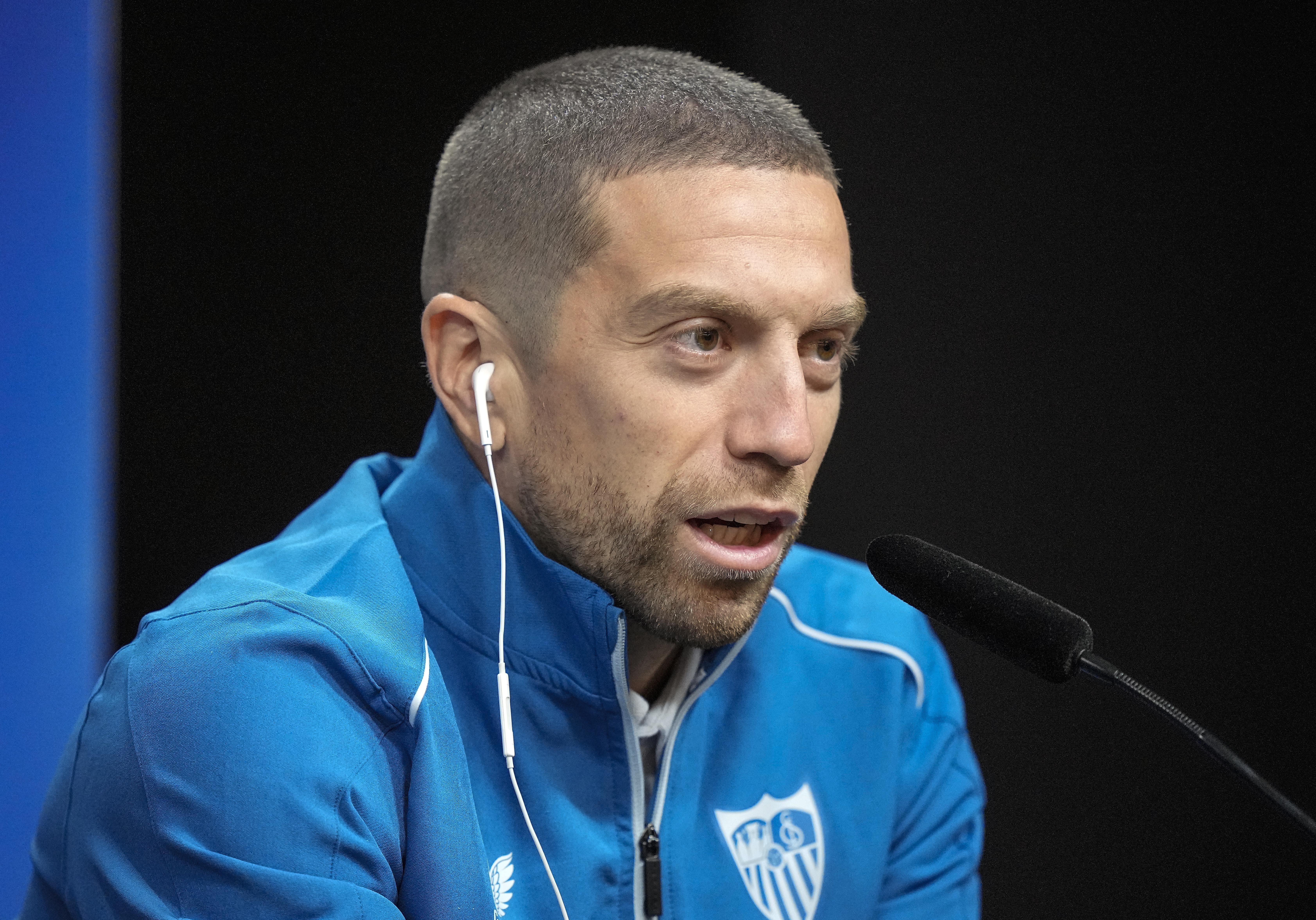 Sevilla's Papu Gomez talks to the media at a press conference prior the Champions League Group G soccer match between Borussia Dortmund and FC Sevilla in Dortmund, Germany, Monday, Oct. 10, 2022. (AP Photo/Martin Meissner)