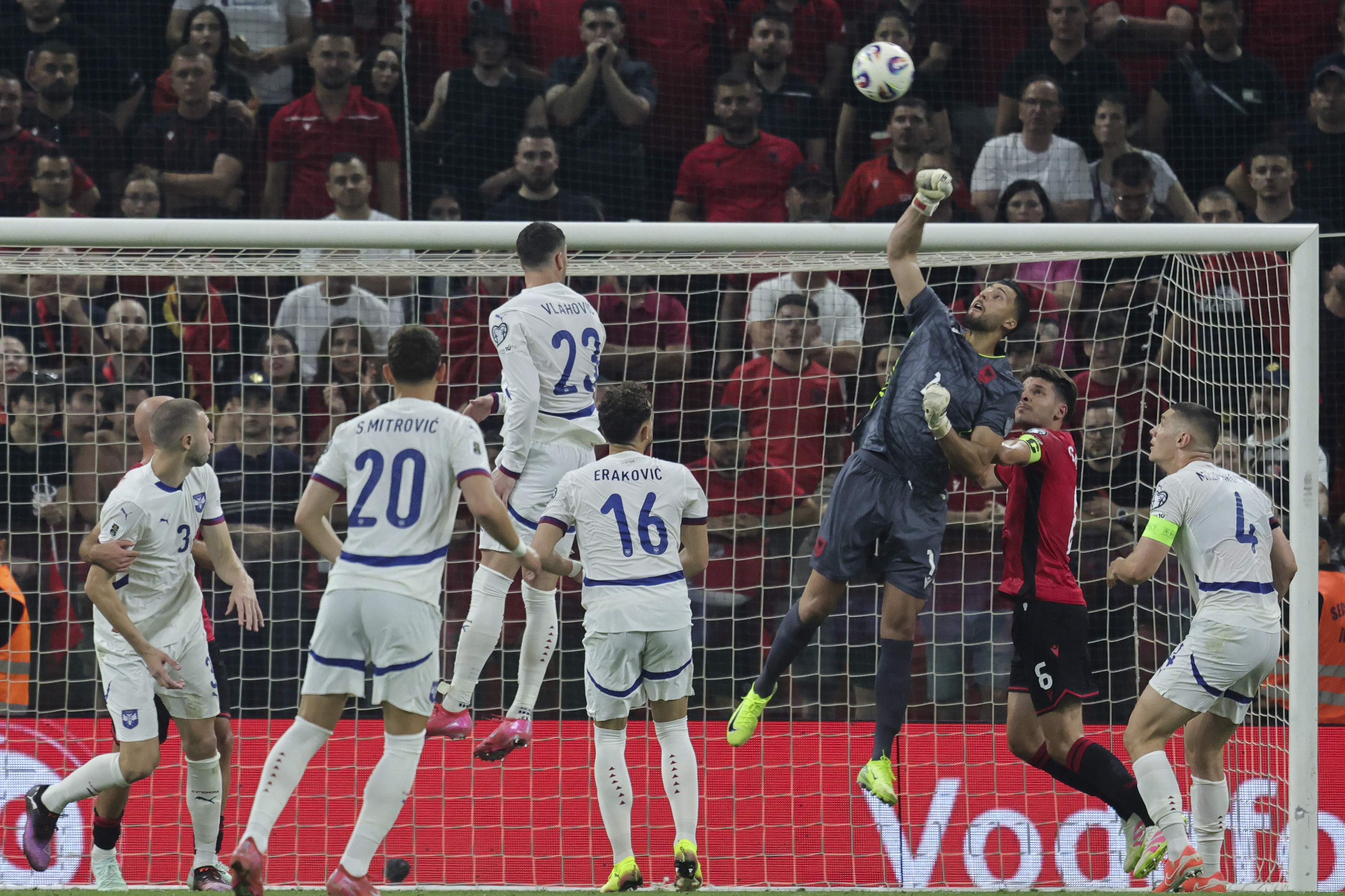 Albania's goalkeeper Thomas Strakosha punches the ball away during a World Cup qualifying soccer match between Albania and Serbia, Saturday, June 7, 2025, at Air Albania stadium in Tirana, Albania. (AP Photo/Vlasov Sulaj)