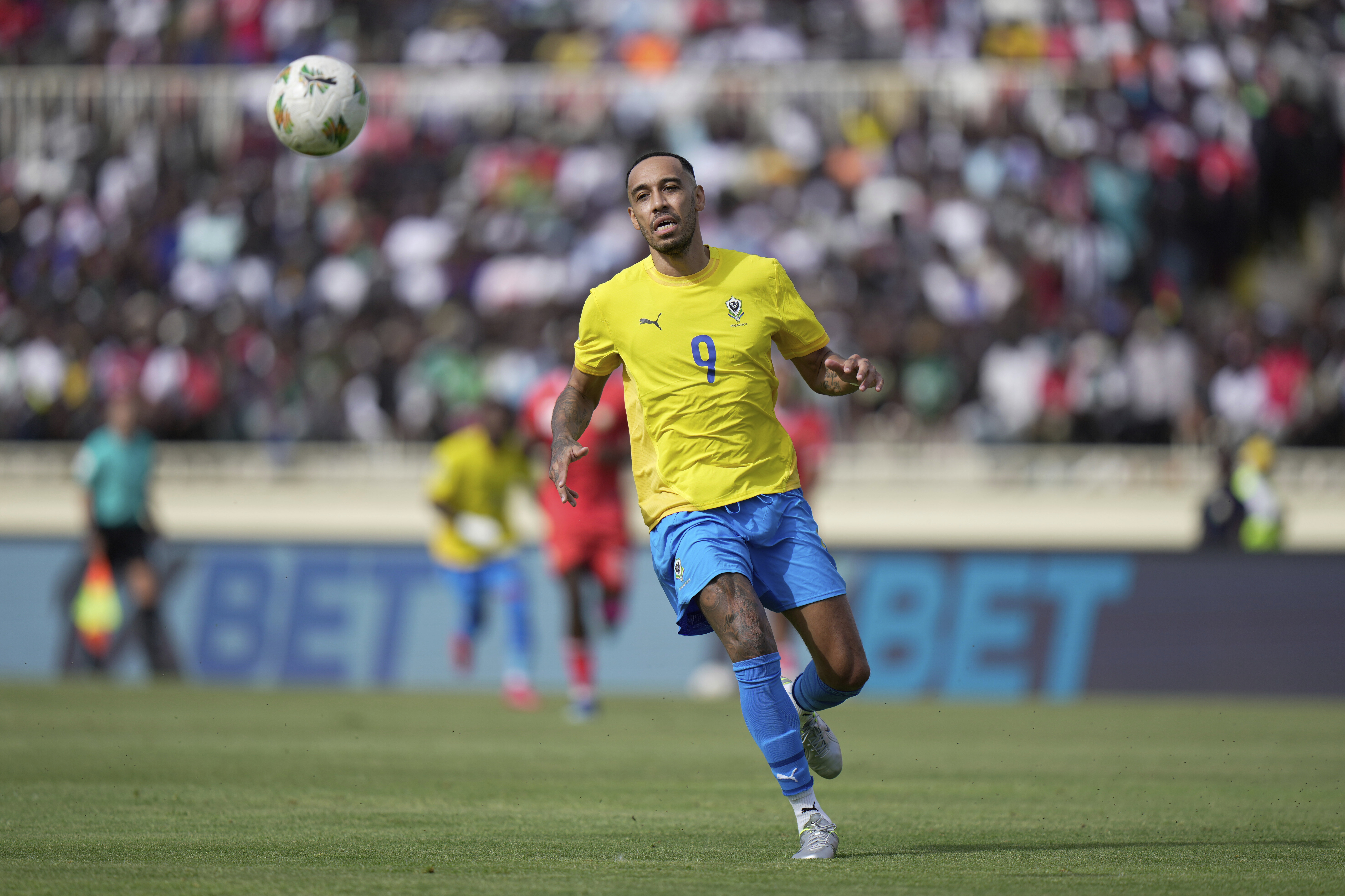 Gabon's Pierre-Emerick Aubameyang looks at the ball during the World Cup group F qualifying soccer match between Kenya and Gabon at the Nyayo national stadium in Nairobi, Kenya, Sunday March 23, 2025. (AP Photo/Brian Inganga)