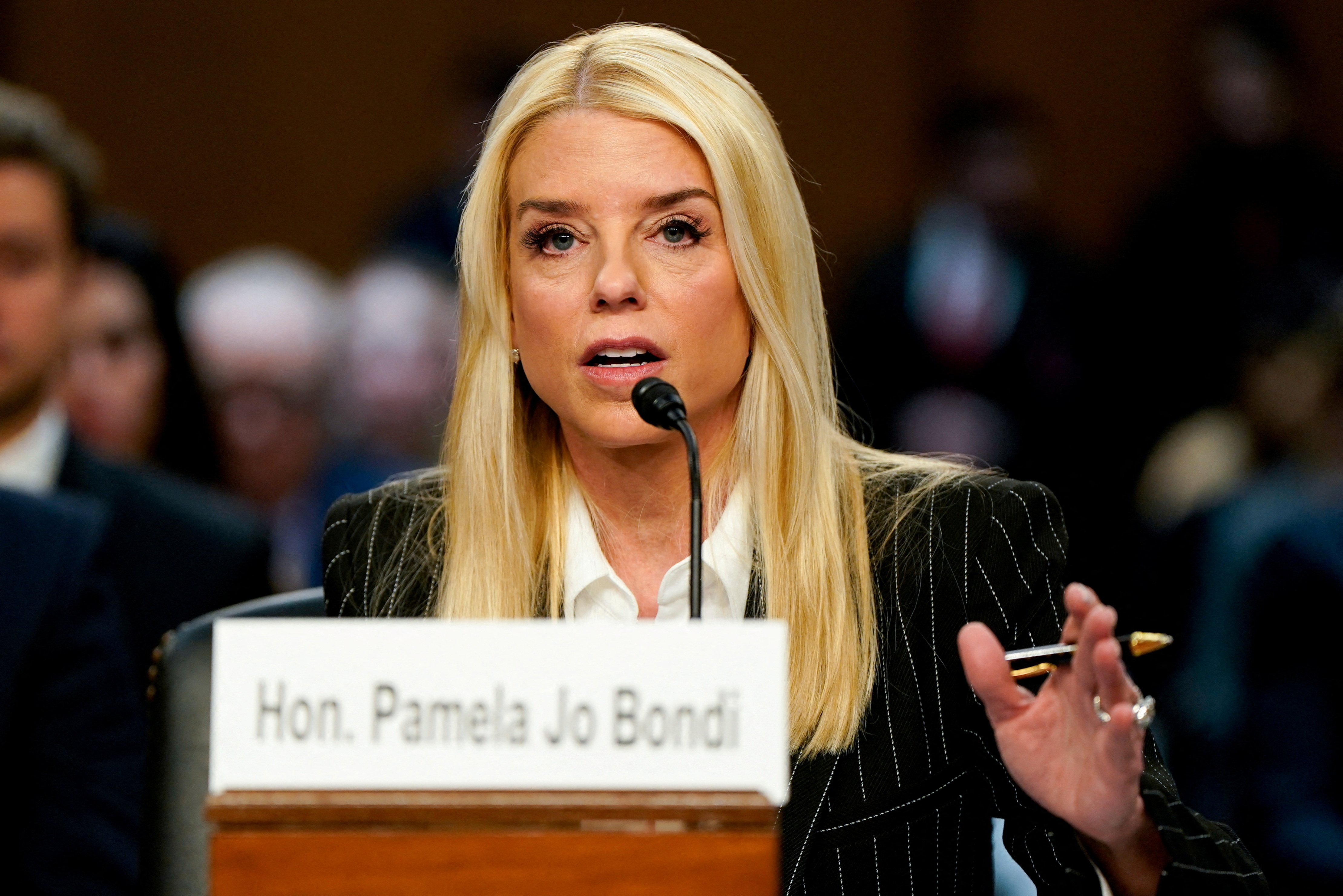 FILE PHOTO: Pam Bondi, U.S. President-elect Donald Trump's nominee to be attorney general, testifies at a Senate Judiciary Committee confirmation hearing on Capitol Hill in Washington, U.S., January 15, 2025. REUTERS/Elizabeth Frantz/File Photo