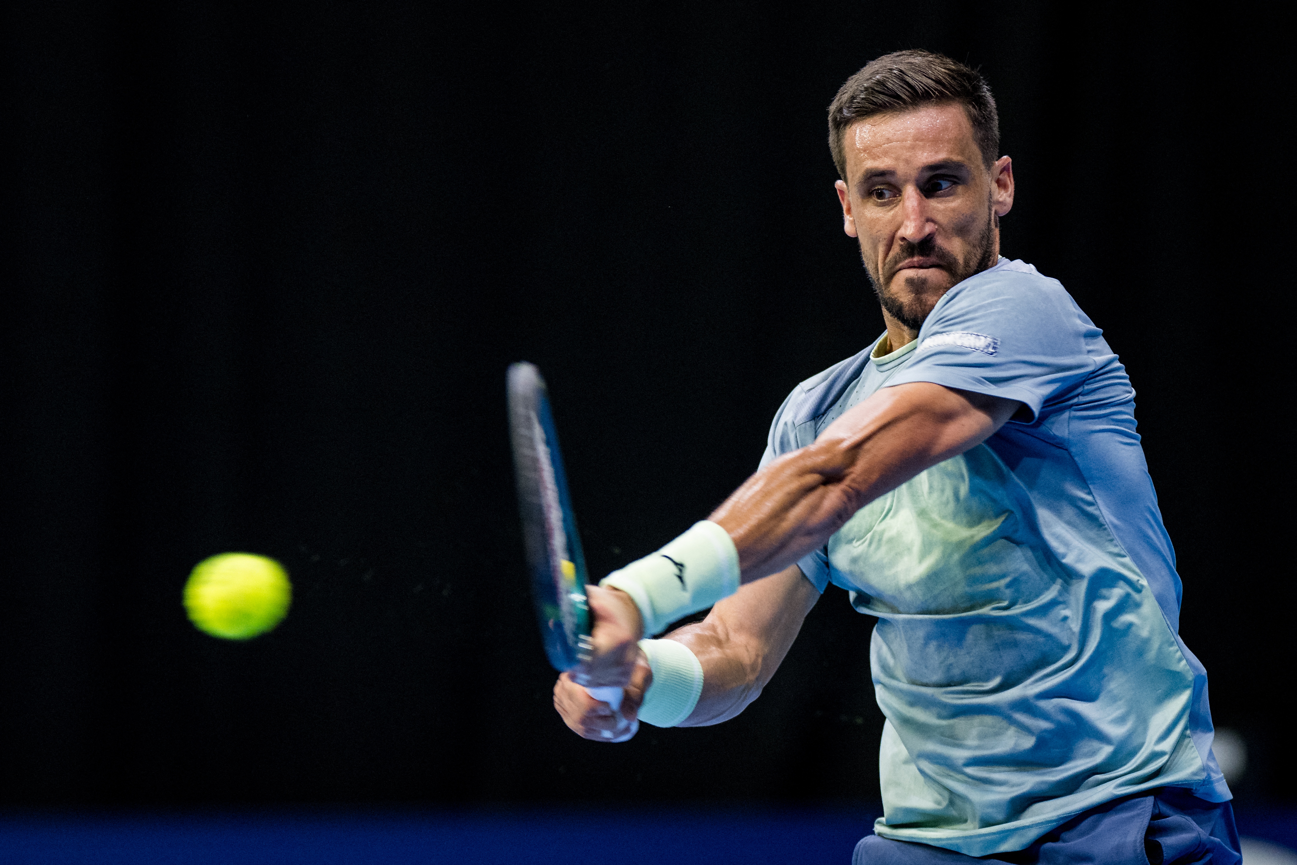 Bosnia's Damir Dzumhur returns the ball to Italy's Federico Cina during the European Open ATP tennis tournament in Brussels on October 15, 2025. (Photo by JASPER JACOBS / Belga / AFP) / Belgium OUT