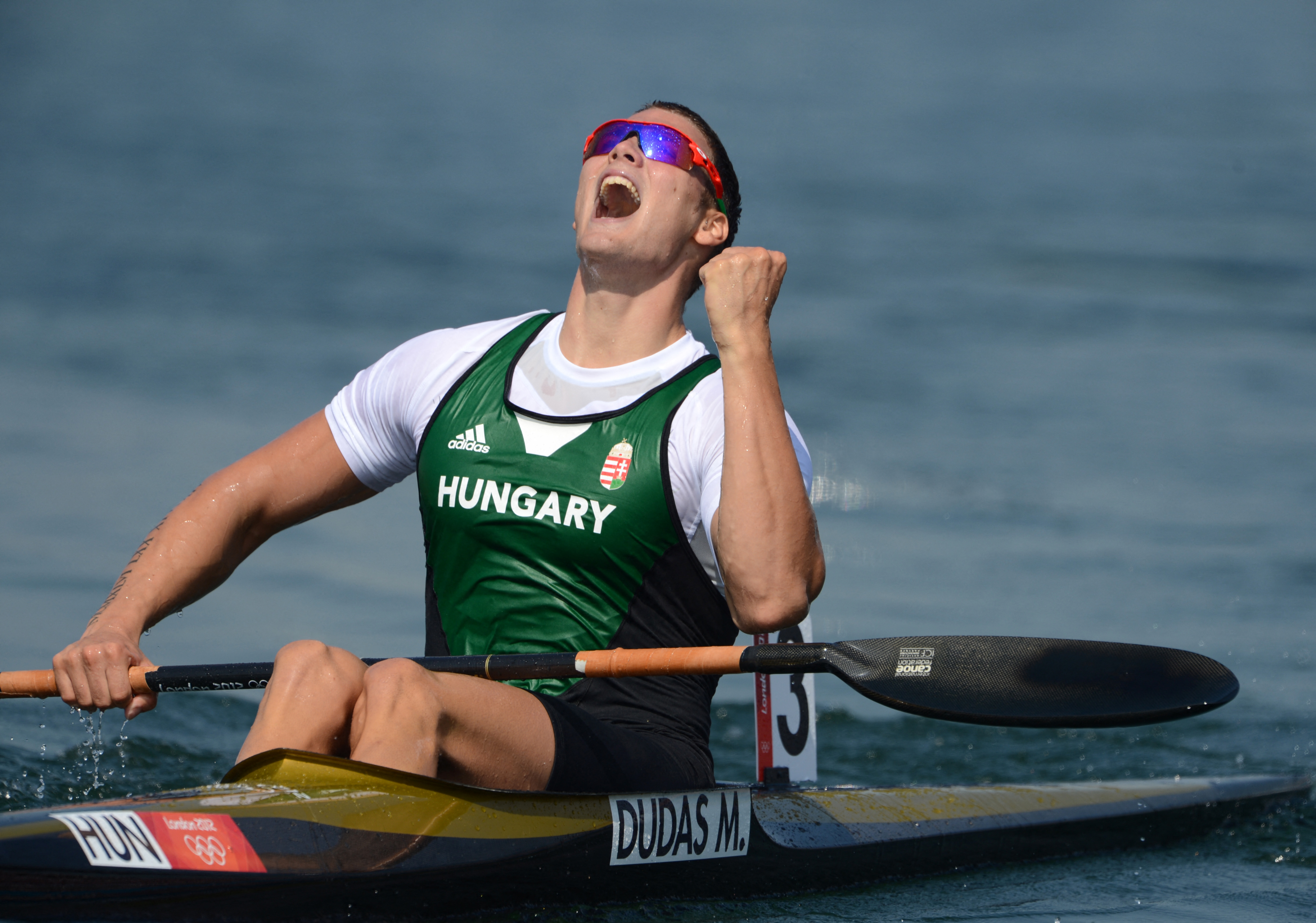 Hungary's Miklos Dudas celebrates after competing in the kayak single (K1) 200m