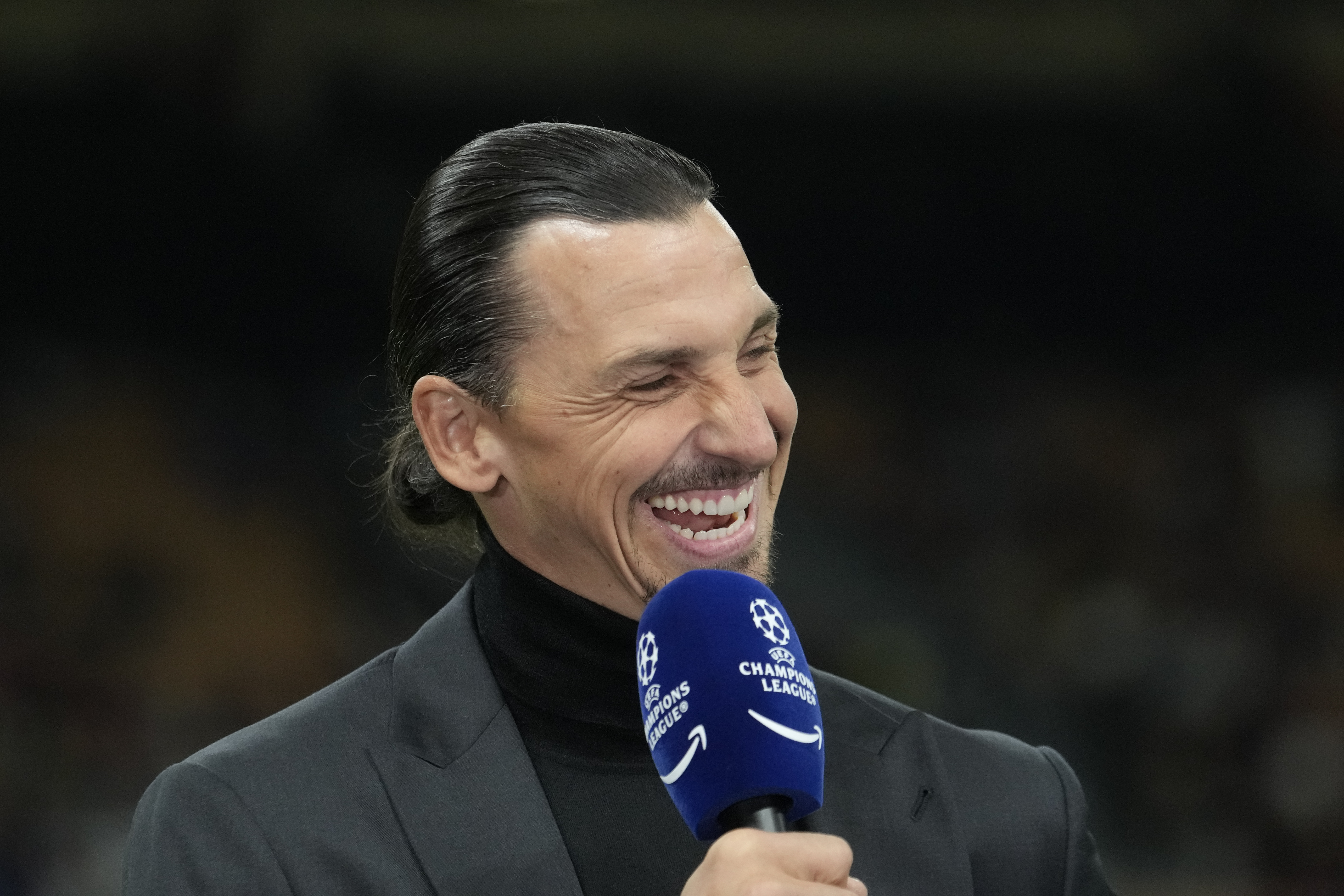 Former soccer player Zlatan Ibrahimovic gives an interview prior to the Champions League opening phase soccer match between AC Milan and Liverpool in Milan, Italy, Tuesday, Sept. 17, 2024. (AP Photo/Luca Bruno)