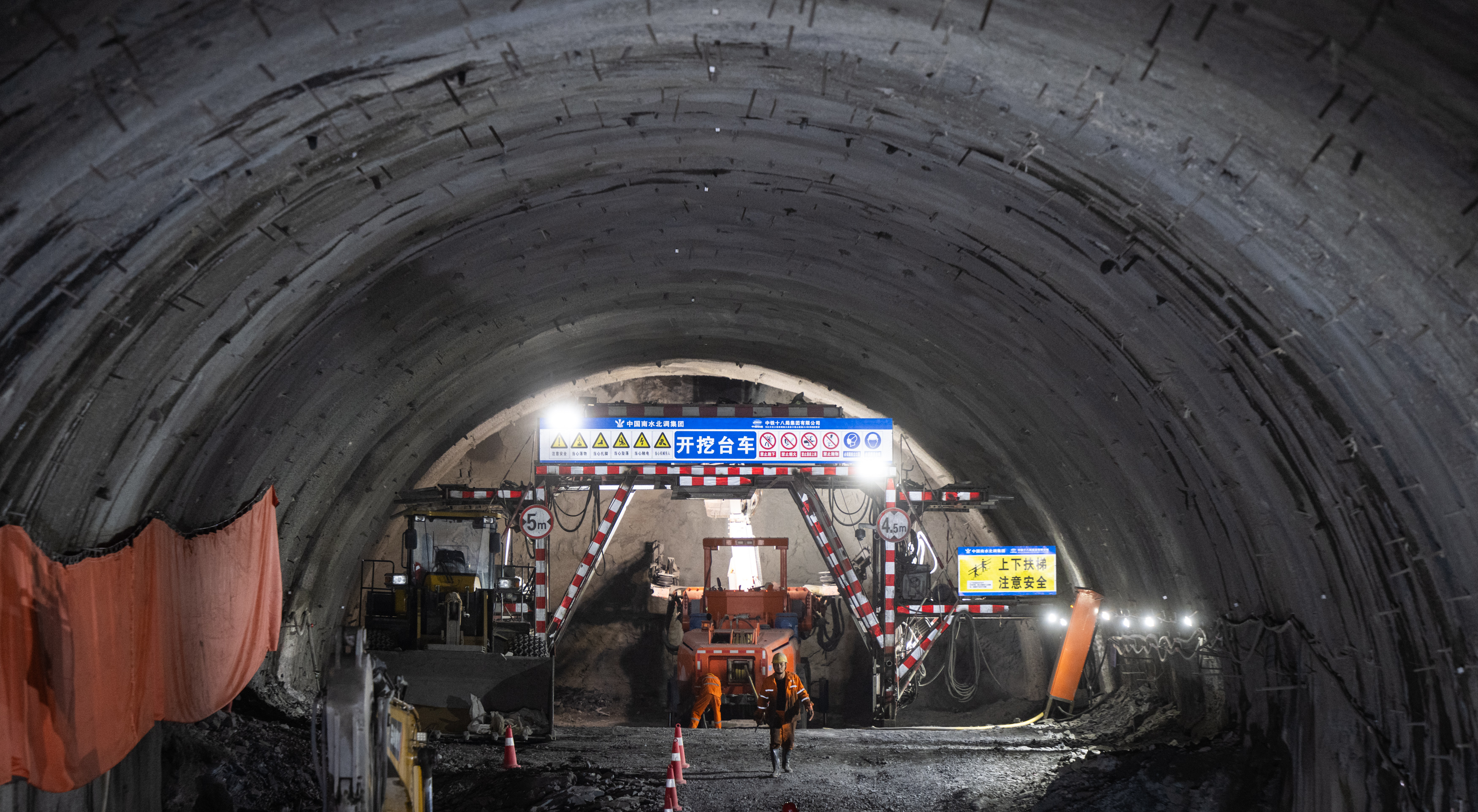 BAOKANG, Jan. 9, 2024  -- Workers are seen at the construction site