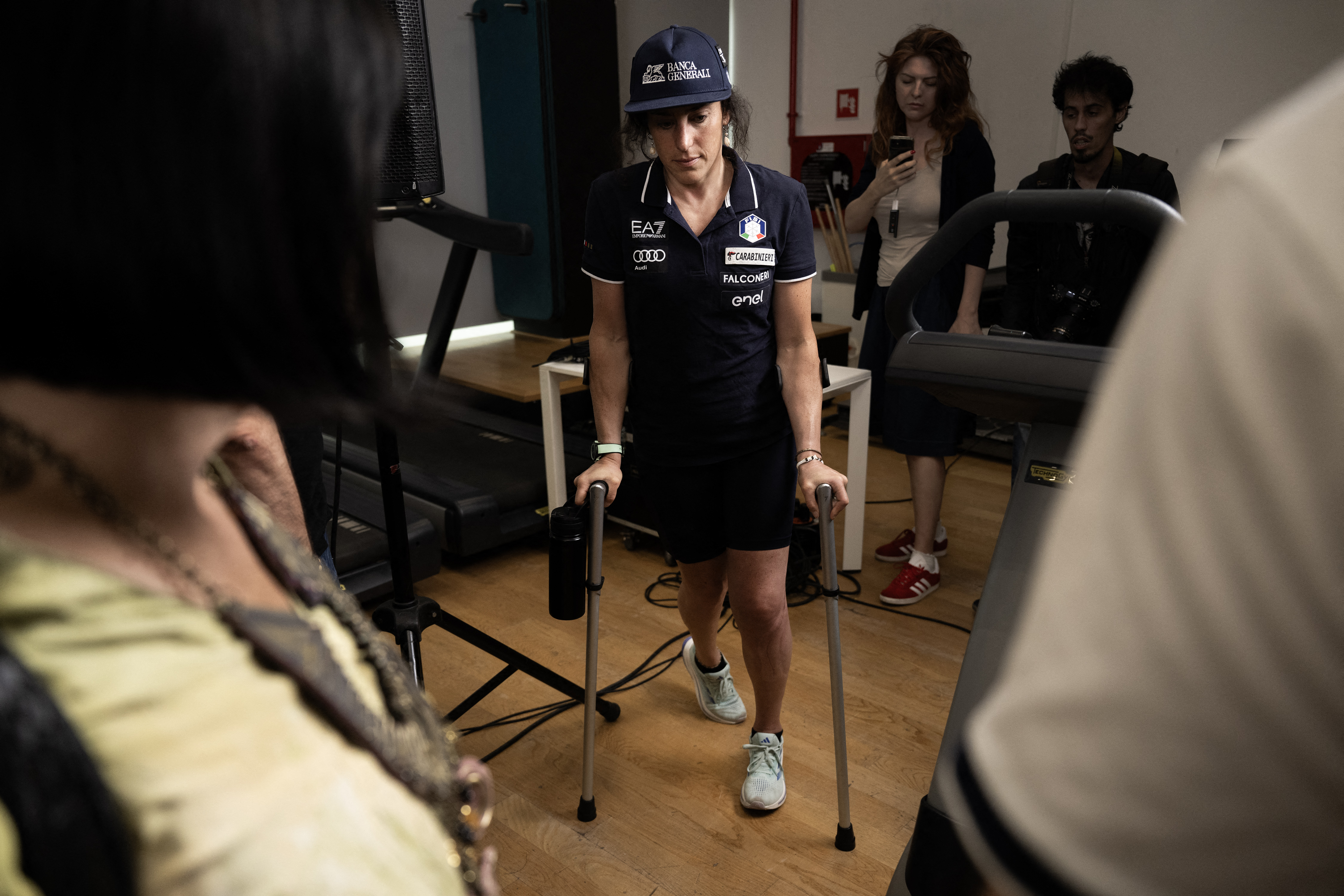 Italian skier Federica Brignone leaves after a press conference at the JMedical Center in Turin on June 3, 2025. Italian ski star Federica Brignone faces a race against time to be fit for next year's Winter Olympics as she recovers from a broken leg at th