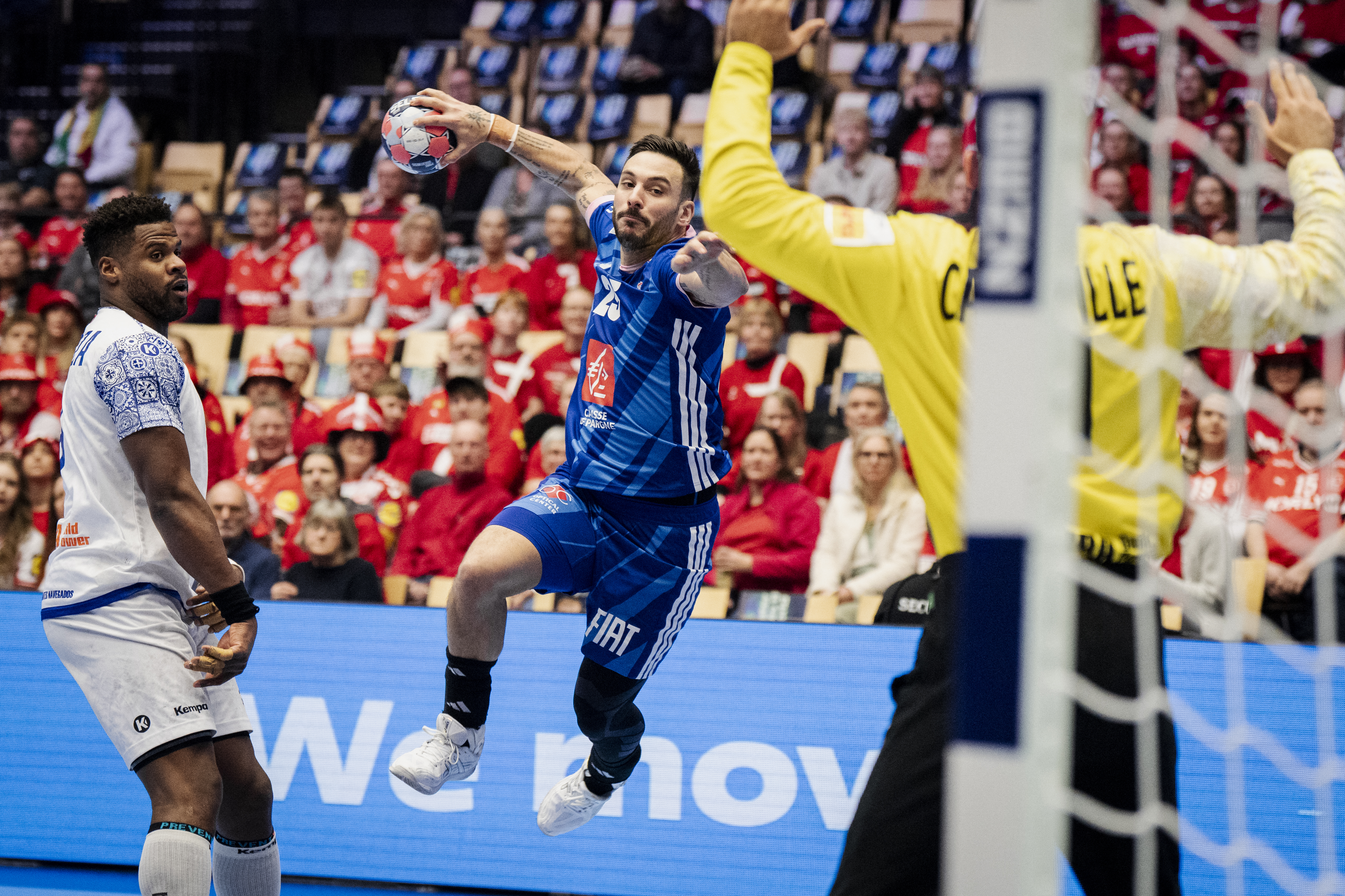 France's wing #25 Hugo Descat shoots the ball during the men's EHF Euro 2026 main round handball match France vs Portugal in Herning, Denmark, on January 24, 2026. (Photo by Sebastian Elias Uth / Ritzau Scanpix / AFP) / Denmark OUT