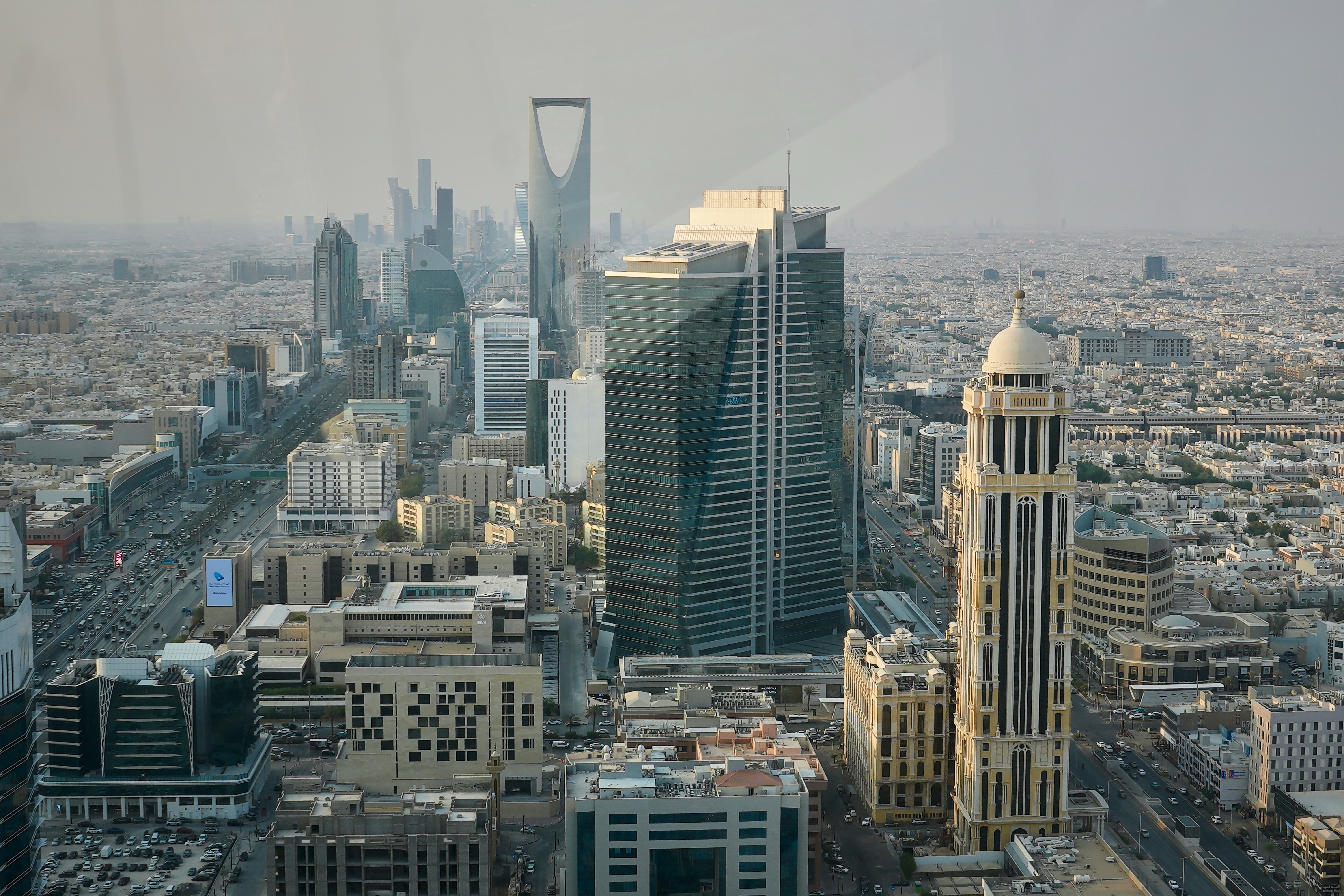 Buildings line King Fahd Road in the Olaya district of Riyadh, Saudi Arabia, Wednesday, Oct. 14, 2026 (AP Photo/Baraa Anwer)