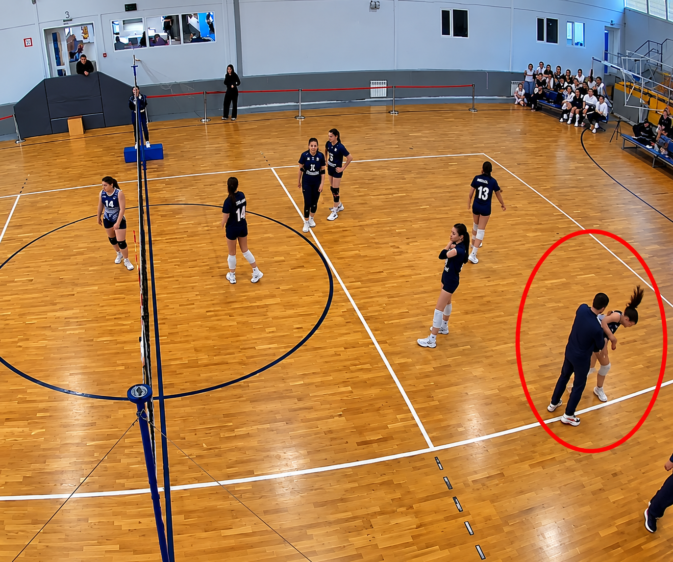 Wide-Angle Volleyball Match in Gymnasium