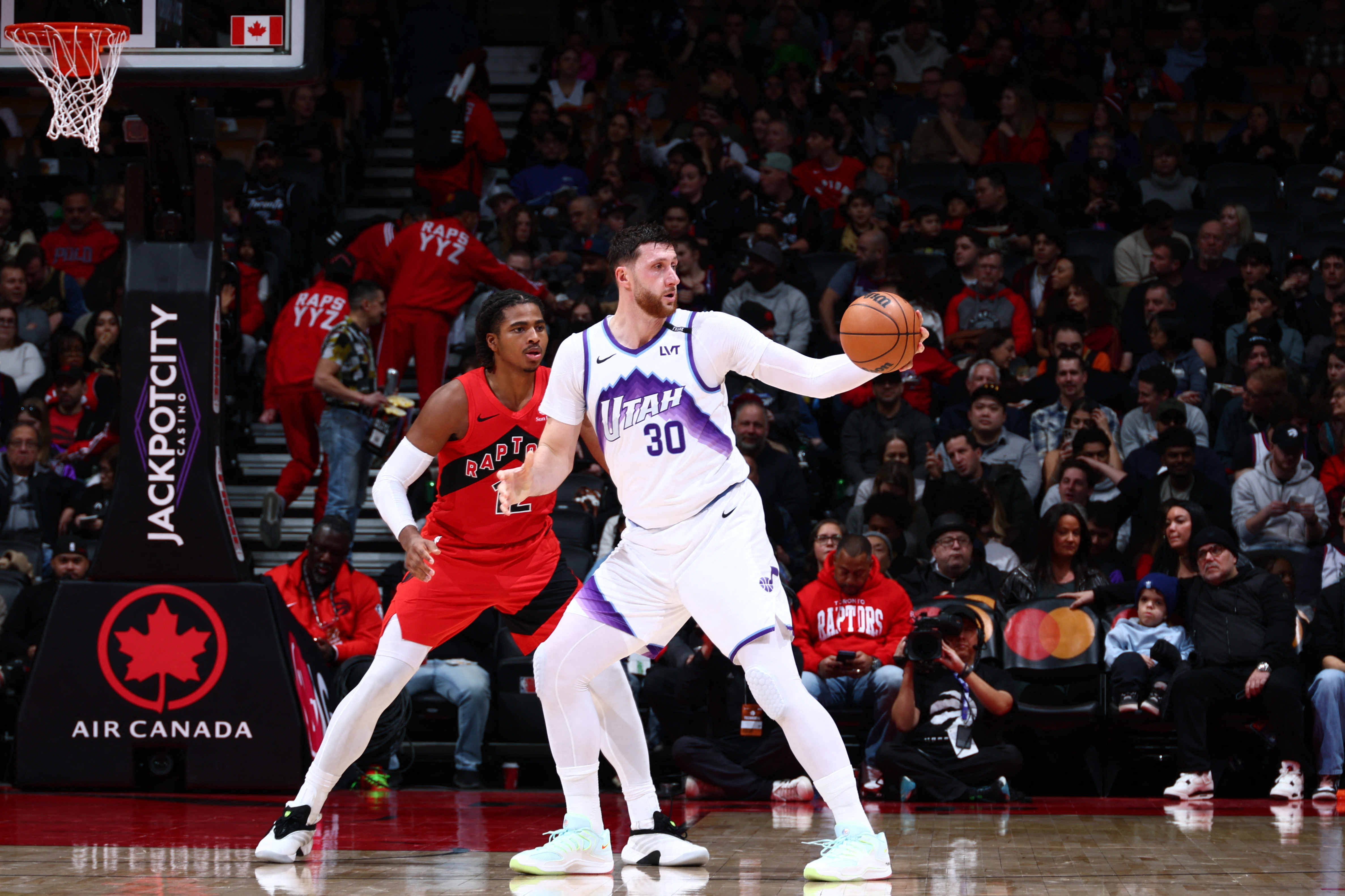 TORONTO, CANADA - FEBRUARY 1: Jusuf Nurkic #30 of the Utah Jazz handles t