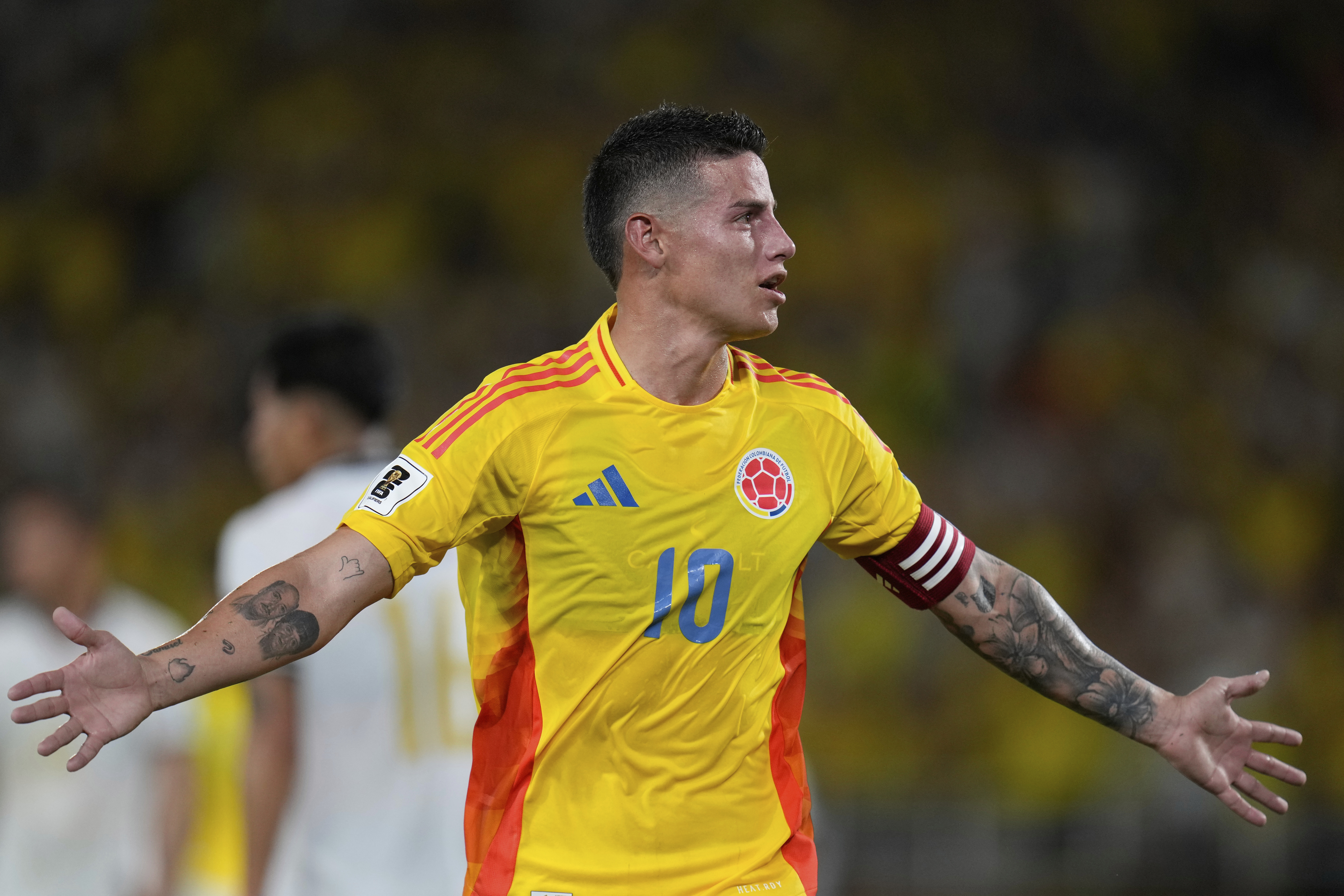 Colombia's James Rodriguez celebrates after scoring his side's opening goal against Bolivia during a World Cup 2026 qualifying soccer match at Metropolitano stadium in Barranquilla, Colombia, Thursday, Sept. 4, 2025. (AP Photo/Fernando Vergara)
