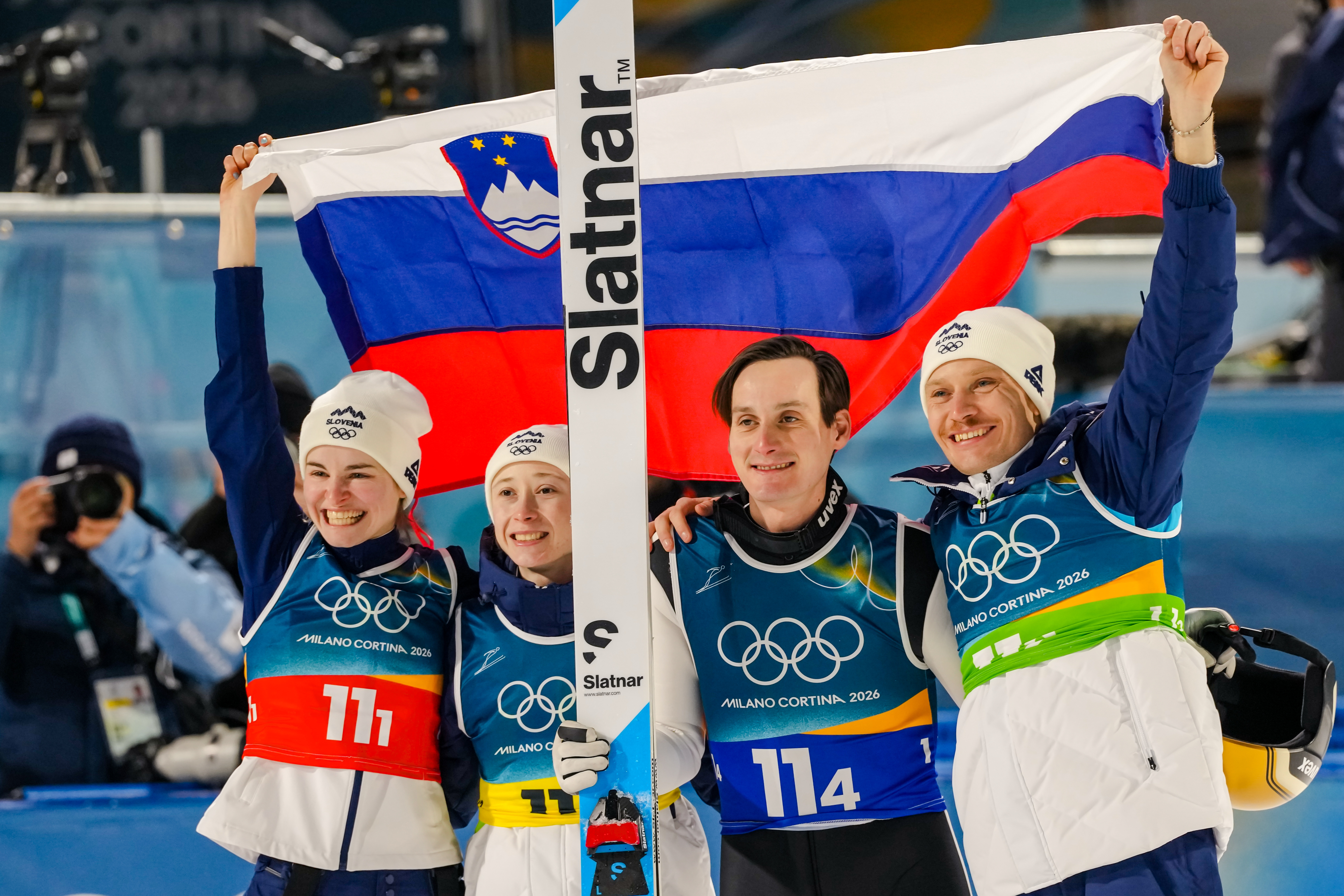 Nika Vodan, from left, Nika Prevc, Domen Prevc, and Anze Lanisek, of Slovenia, pose after winning the gold medal in the ski jumping mixed team competition at the 2026 Winter Olympics, in Predazzo, Italy, Tuesday, Feb. 10, 2026. (AP Photo/Kirsty Wiggleswor