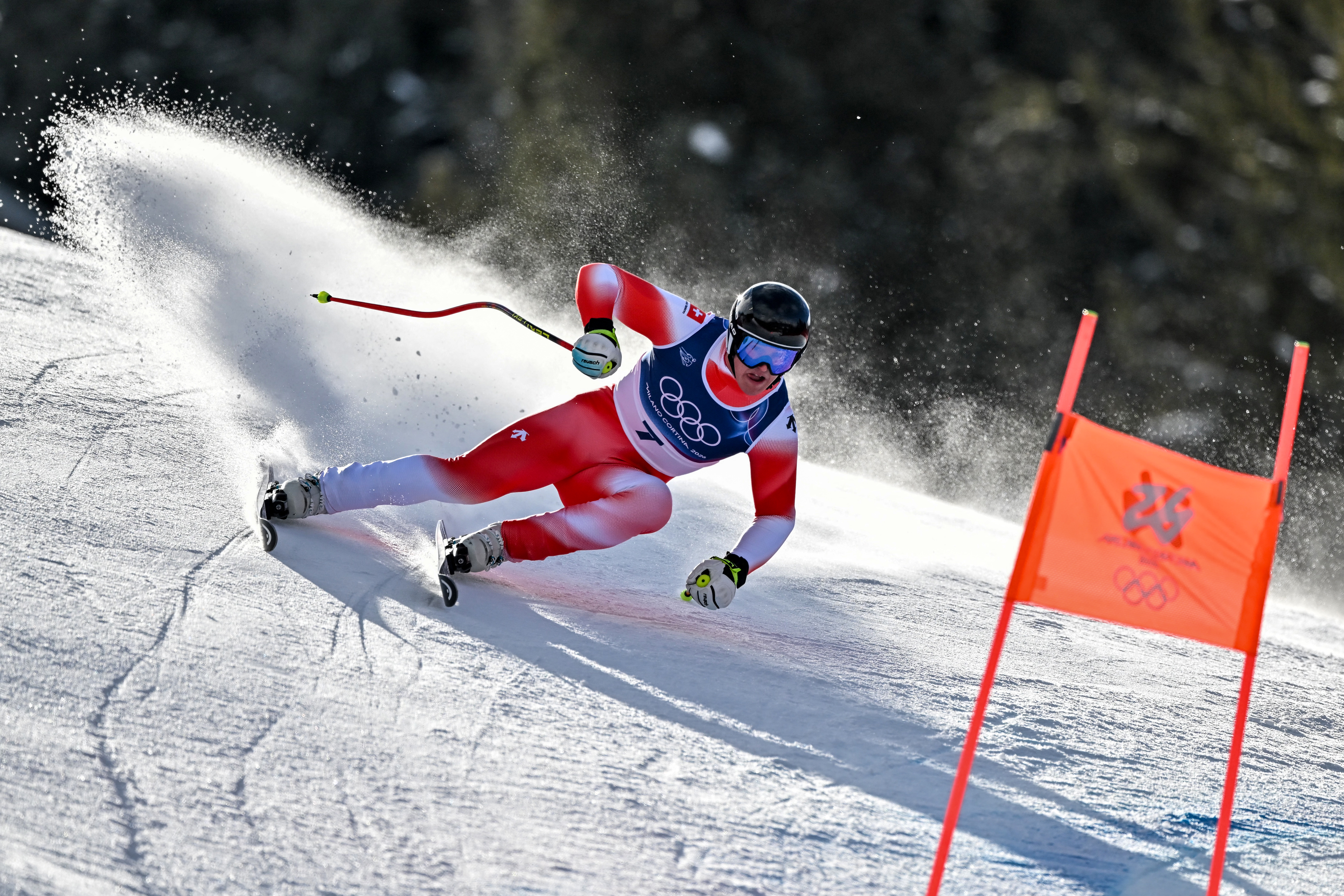 Switzerland's Franjo von Allmen competes in the men's super-G alpine skiing event during the Milano Cortina 2026 Winter Olympic Games at the Stelvio Ski Centre in Bormio (Valtellina) on February 11, 2026. (Photo by Fabrice COFFRINI / AFP)