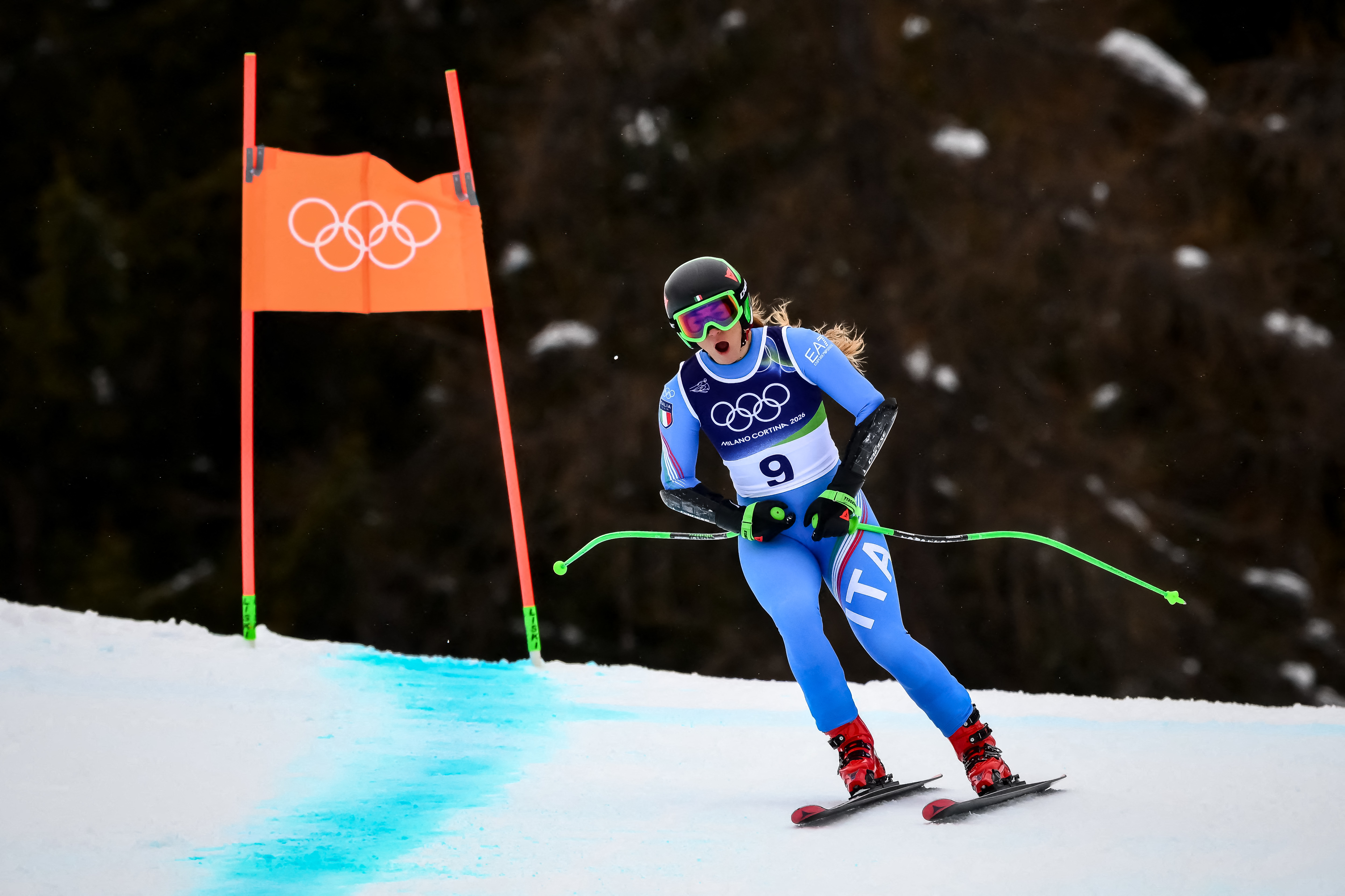 Italy's Sofia Goggia reacts after missing a gate in the women's super-G event during the Milano Cortina 2026 Winter Olympic Games at the Tofane Alpine Skiing Centre in Cortina d’Ampezzo on February 12, 2026. (Photo by Marco BERTORELLO / AFP)